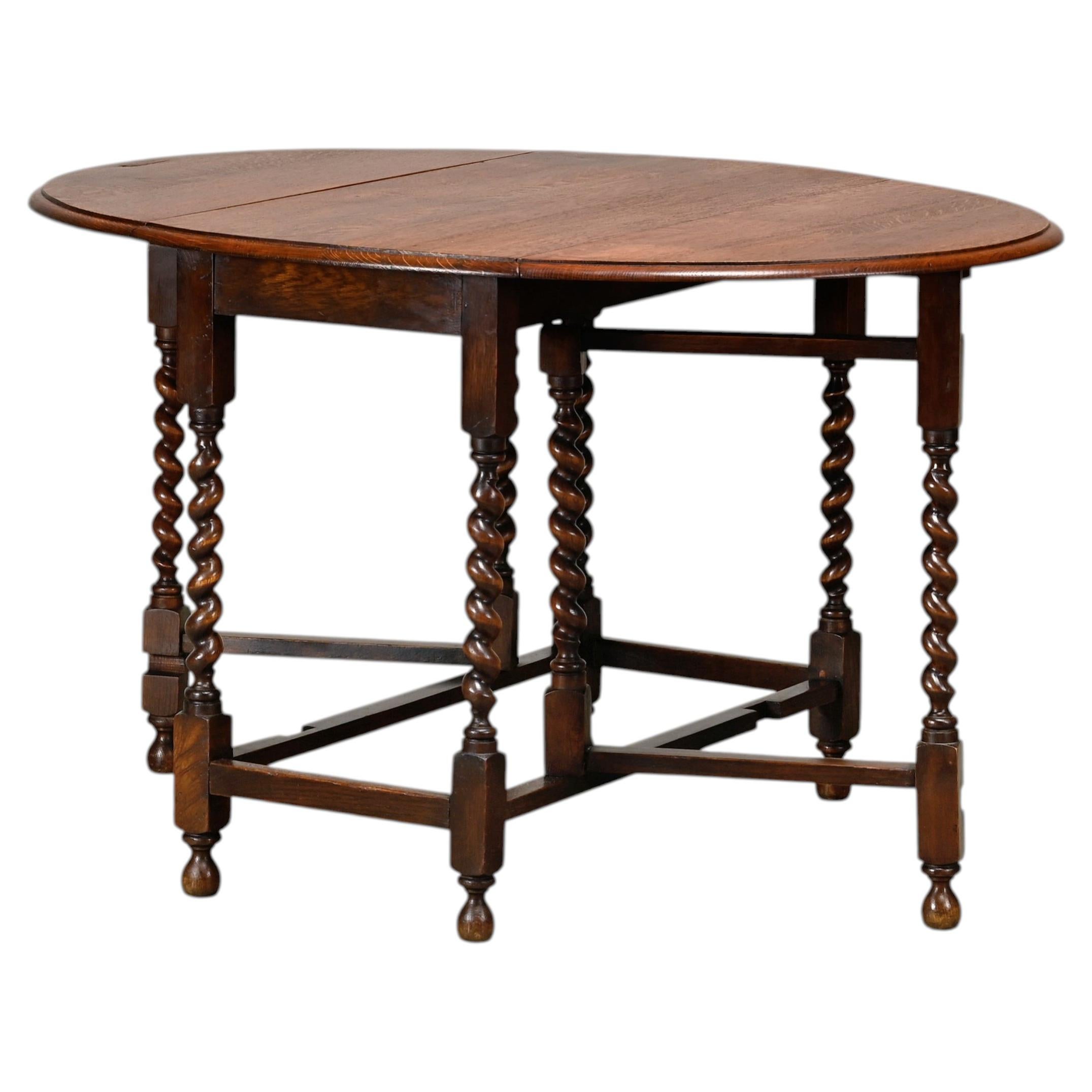 Antique English oval Gateleg Table in solid Oak and turned legs, 19th Century