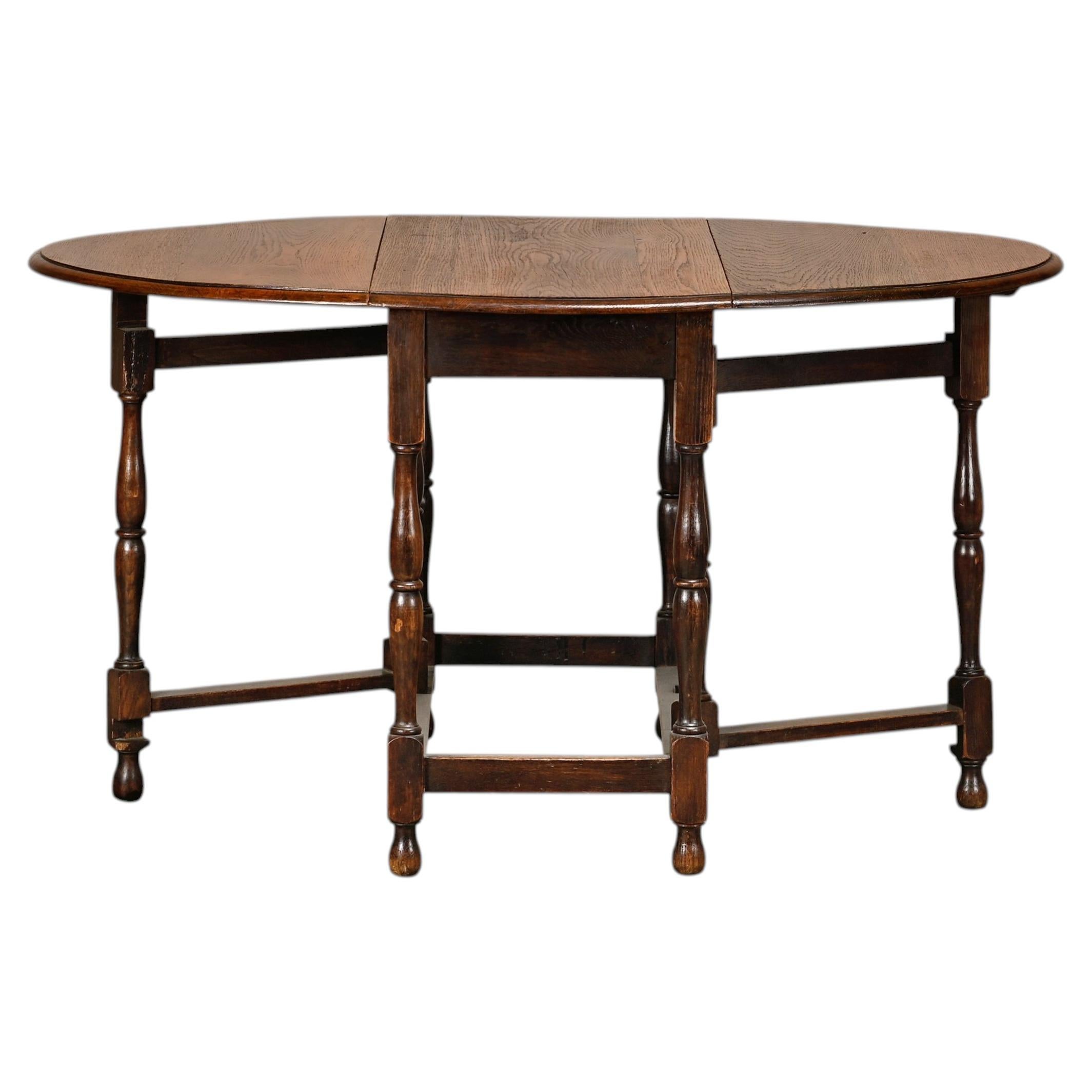 Antique English oval Gateleg Table in solid Oak, Late 19th Century