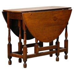 Ancienne table ovale anglaise à tiroir en chêne massif, fin du 19e siècle