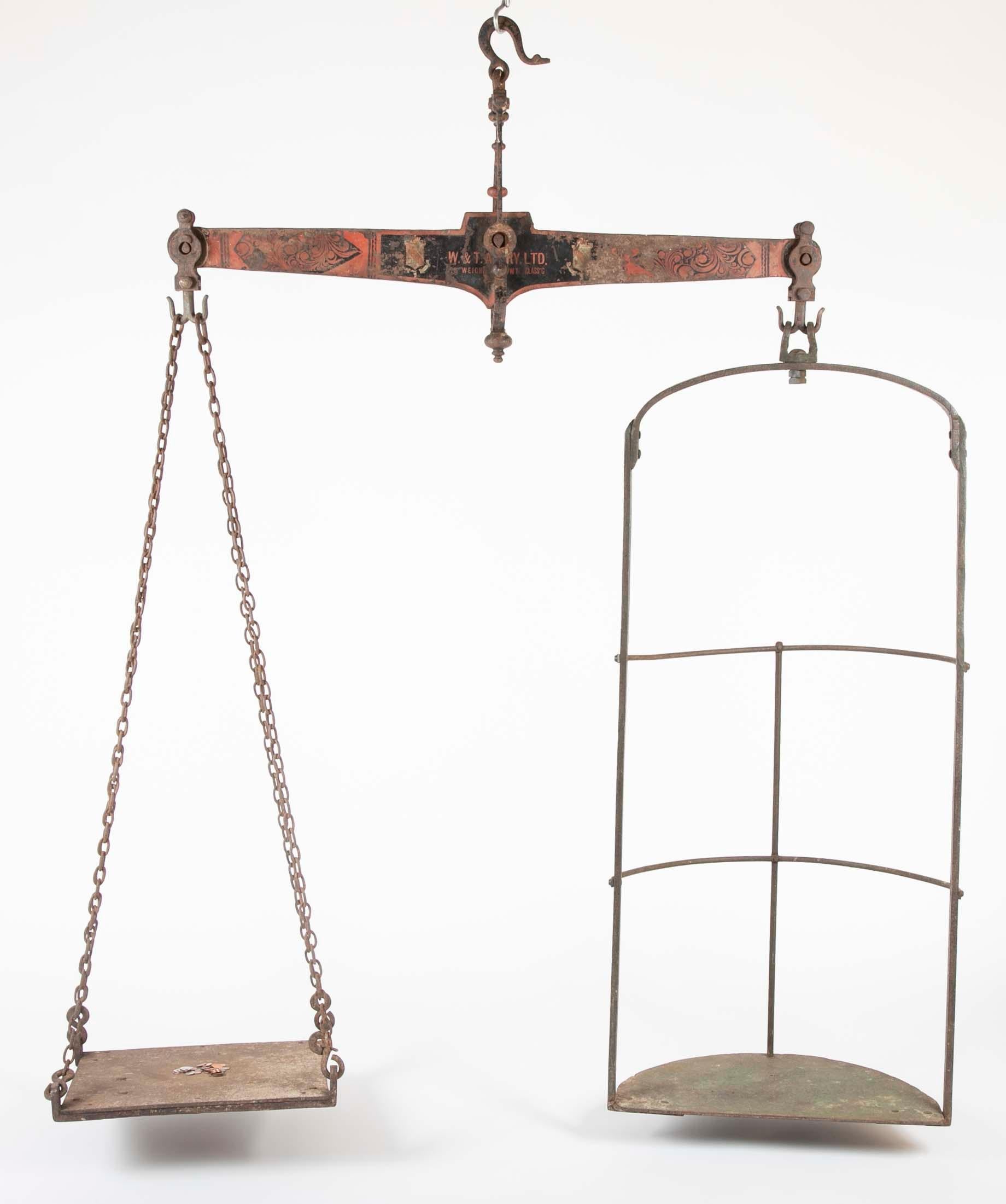 Antique English painted cast iron jockey scale with seat for jockey and balance for weights. Made by W. & T. Avery, Birmingham, England, circa 1850.