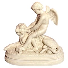 Antigua figura inglesa de loza parisina El poder del amor Cupido y León