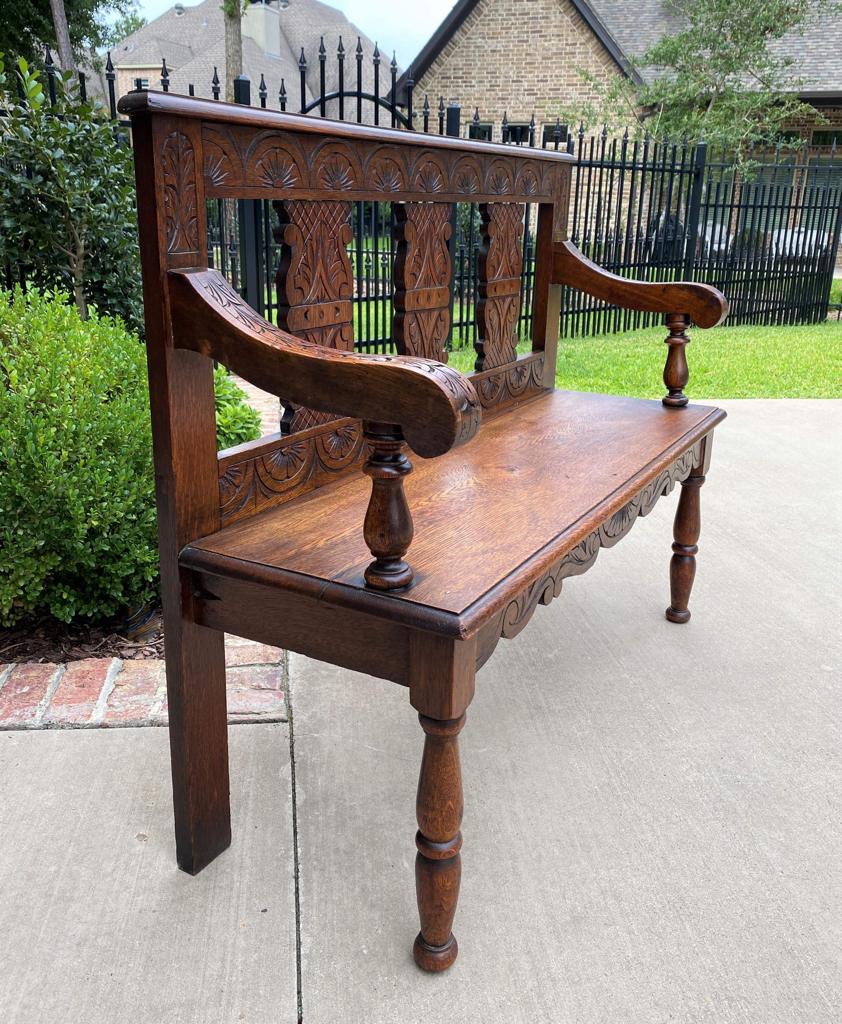 Charming carved oak antique English hall or entry bench, settee or banquette

Charming sunburst and thatched accents on back with scrolled acanthus arms~~these benches are always in high demand!

Versatile piece with so many functions~~use as a