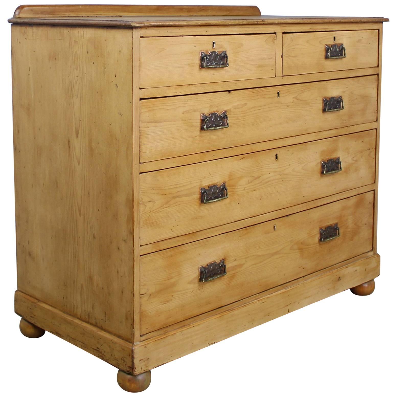 Antique English Pine Chest of Drawers with Decorative Pulls