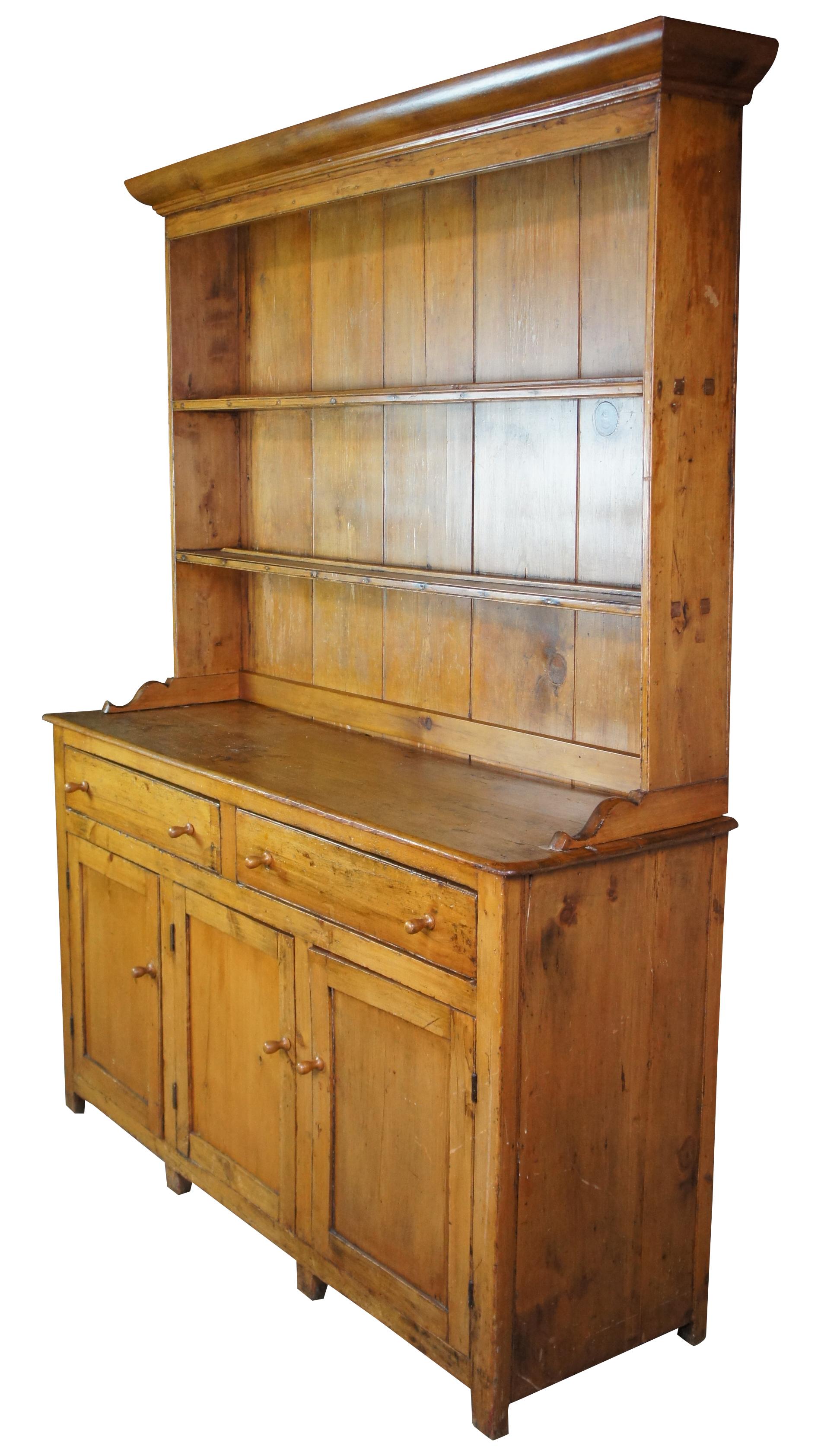 Antique English step back cupboard or china hutch featuring upper shelves with plate grooves and lower cabinet with drawers. Circa 1870s

Surface Height - 34