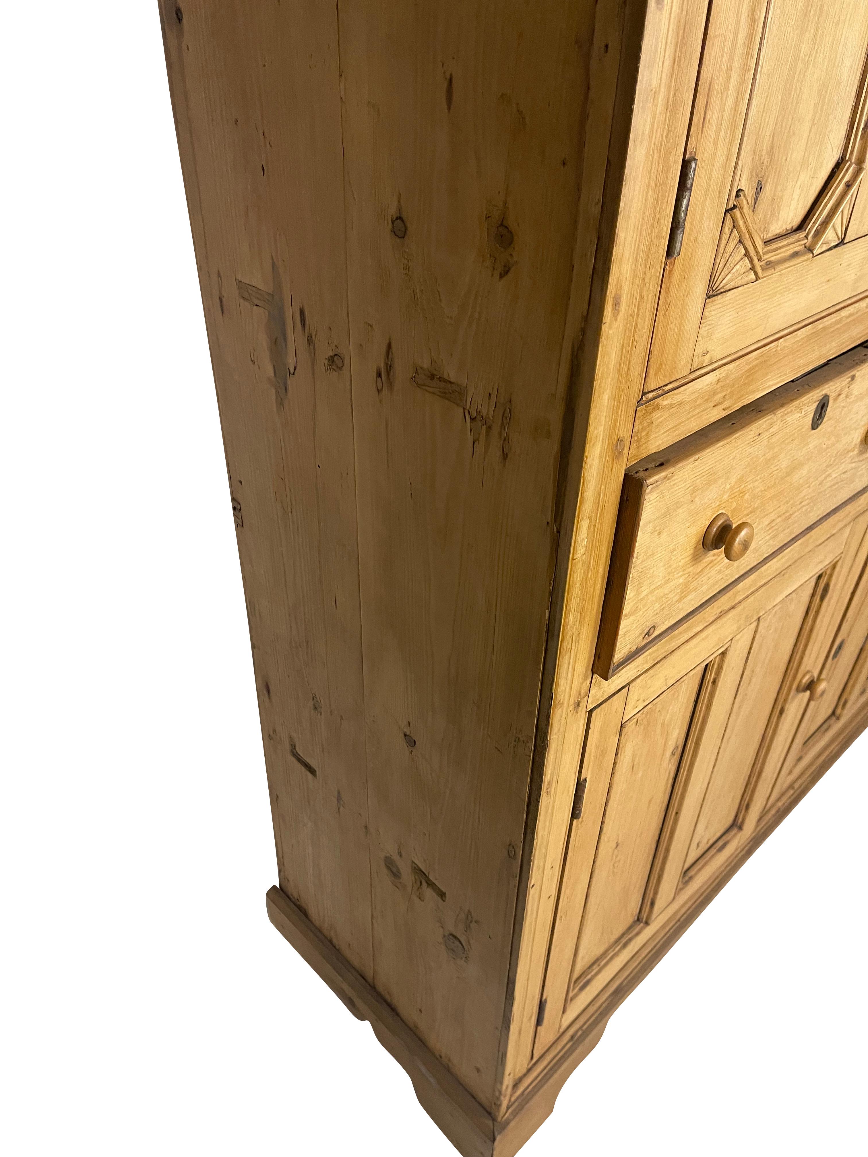 Antique English Pine Cupboard with Glass Door and Decorative Carving at