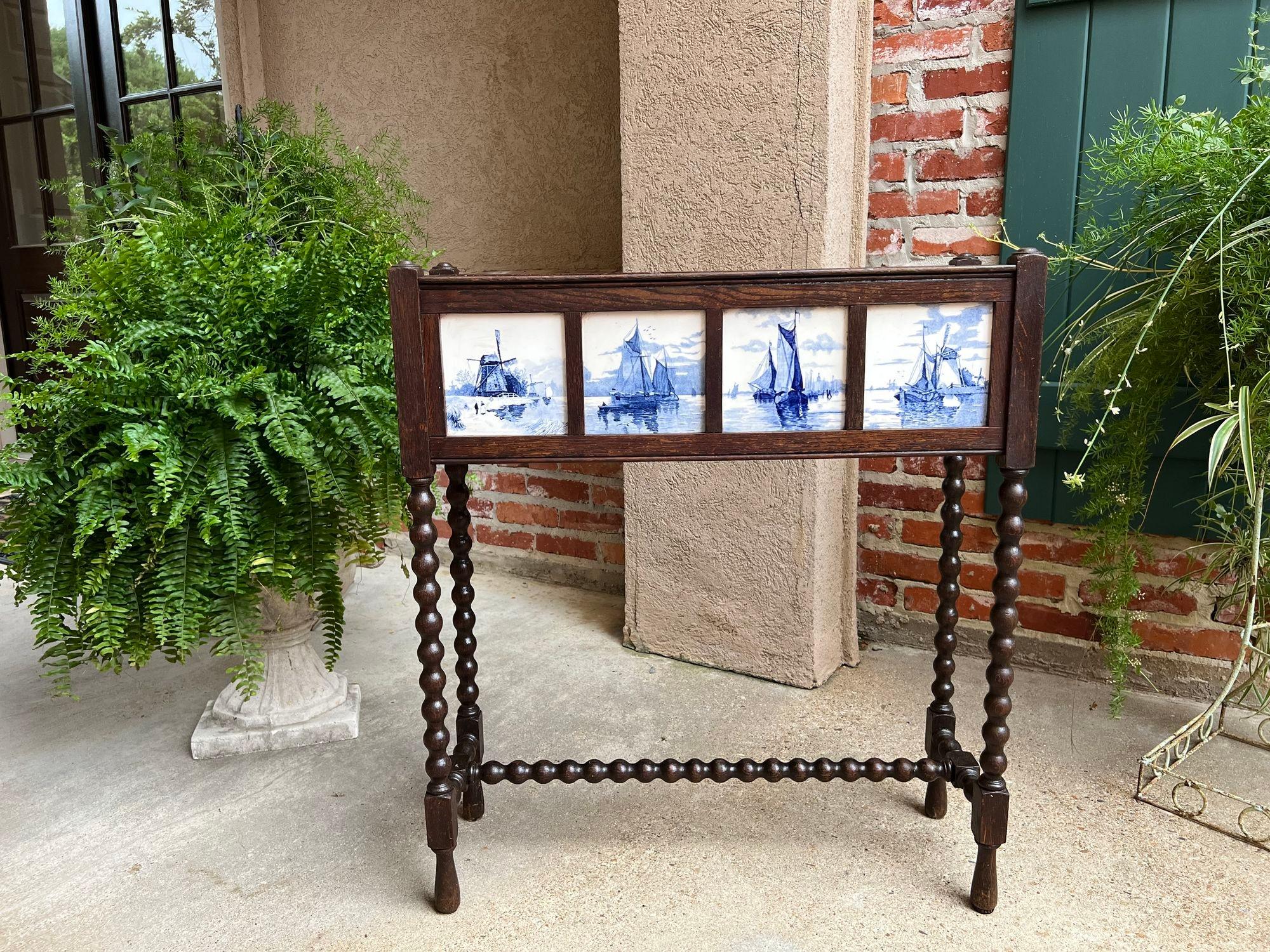 Antique English Planter Blue White DELFT Tile Floral Box Oak Bobbin Legs c1910.

Direct from England, a lovely and quite unique antique planter, with a style and design that is certain to be a focal point in any room!
The upper planter box features
