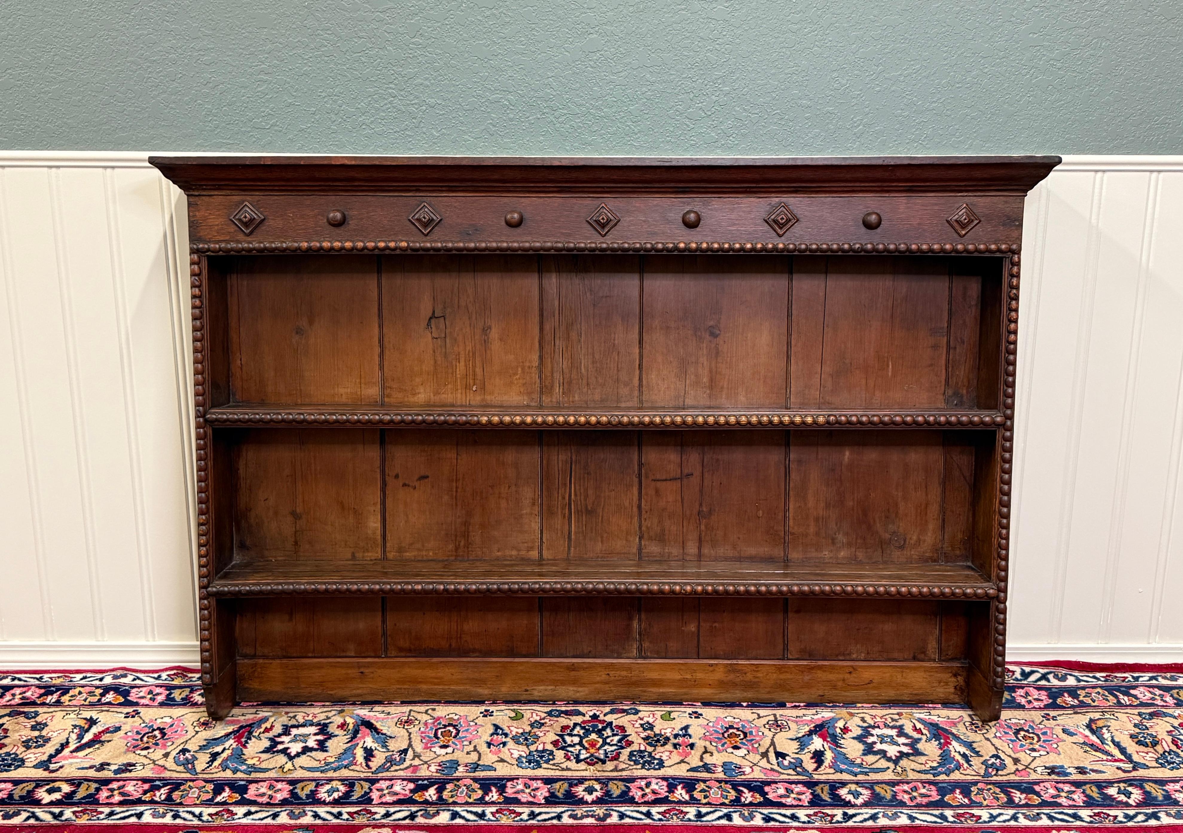 ~~CHARMING Antique English LARGE Jacobean Carved Oak Plate Rack Wall Shelf~~
 
Popular classic English hanging wall plate rack with carved diamonds and buttons~~plate grooves and hangers on back~~perfect for an entry hall, kitchen, living area,