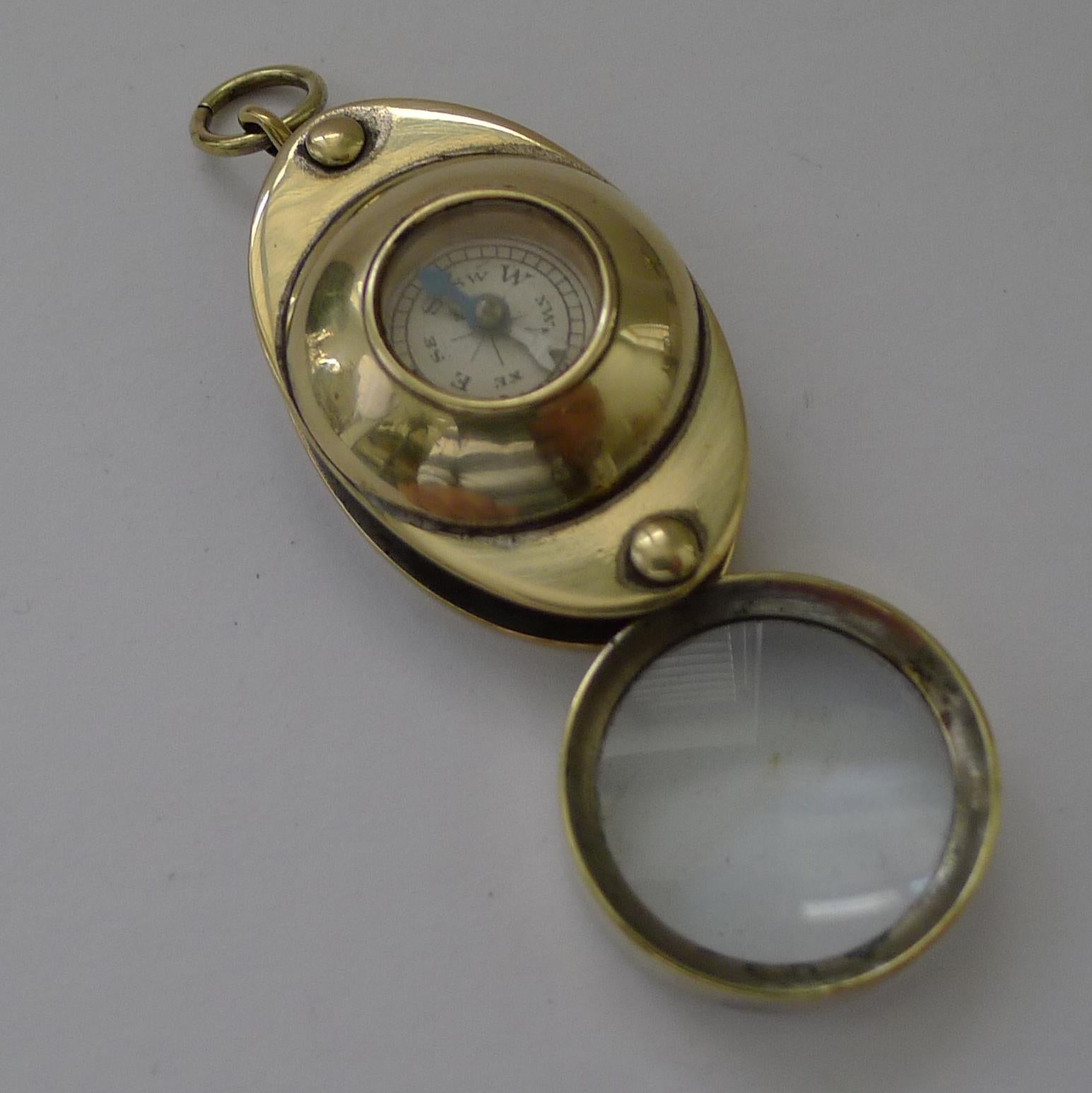 A charming little folding loop or magnifying glass made from brass, dating to the early twentieth century, circa 1910.

What of course makes it highly collectable is the inset working compass. A novelty piece in excellent condition. 1 1/2
