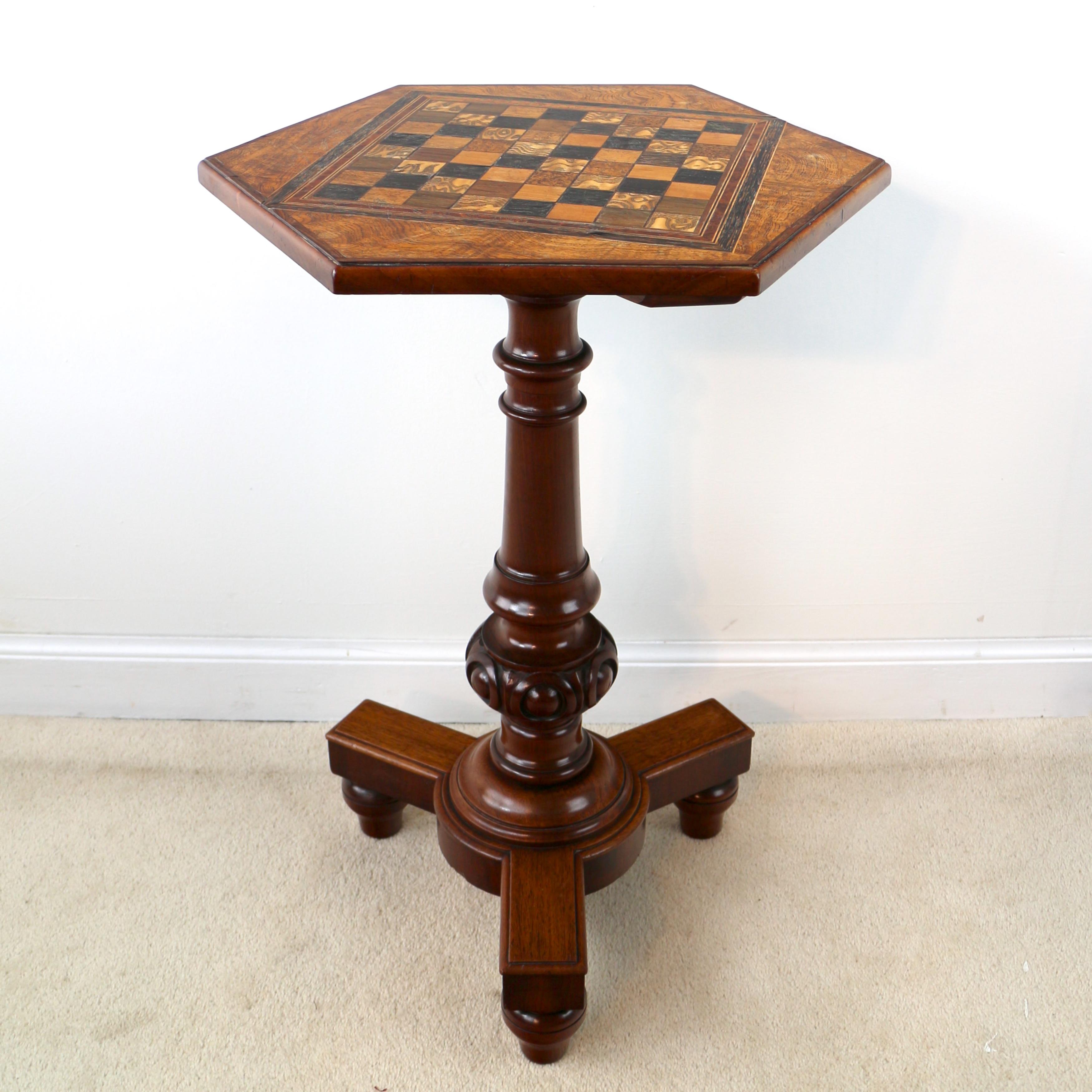 Rare 19th century pollard oak specimen chess or games table, the hexagonal shaped top inlaid with chequers in prized specimen veneers including ebony, Coromandel, rosewood, thuya, satinwood and burr elm and banded with amboyna and Coromandel with