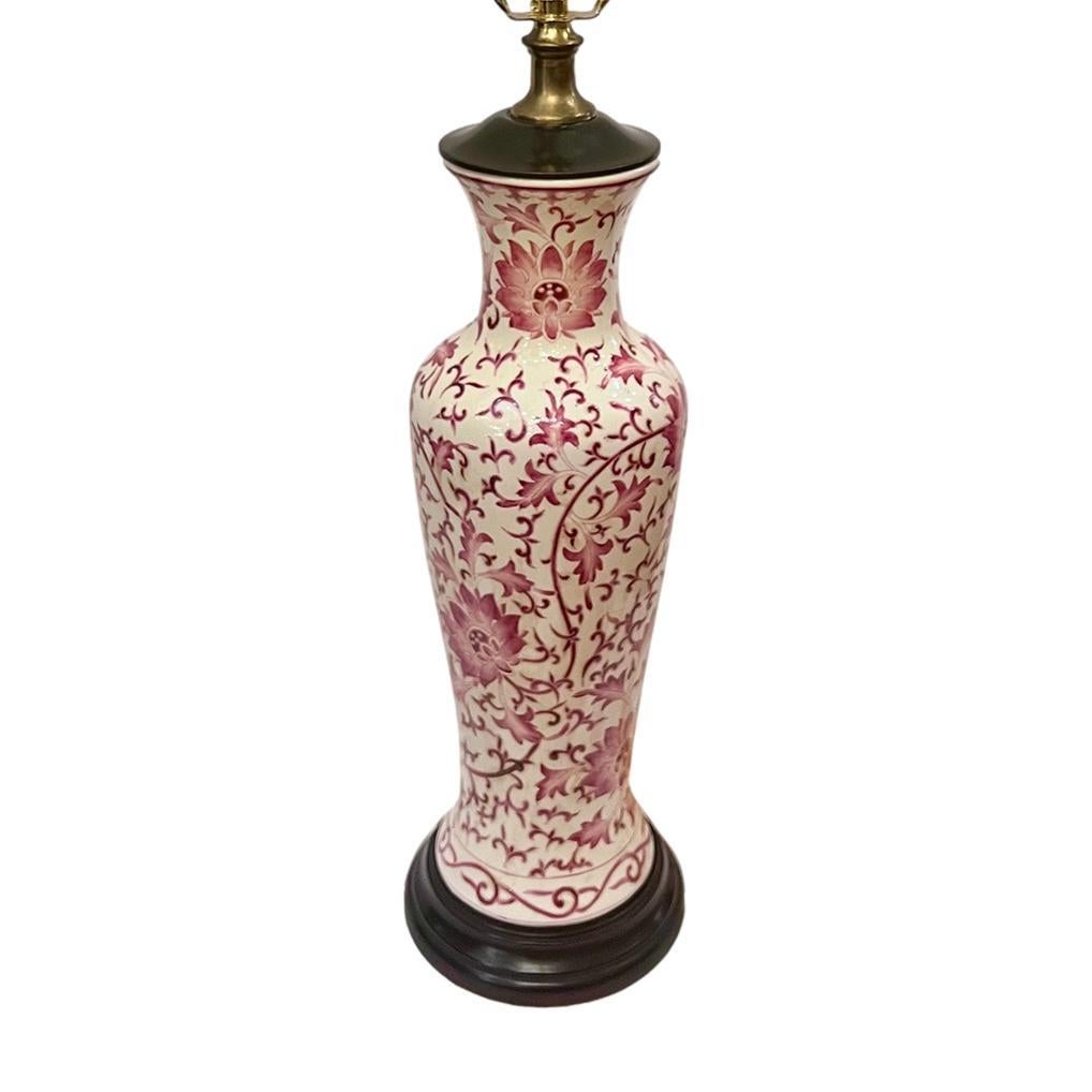A single circa 1930's English porcelain table lamp with floral decoration.

Measurements:
Height of body: 19.5
