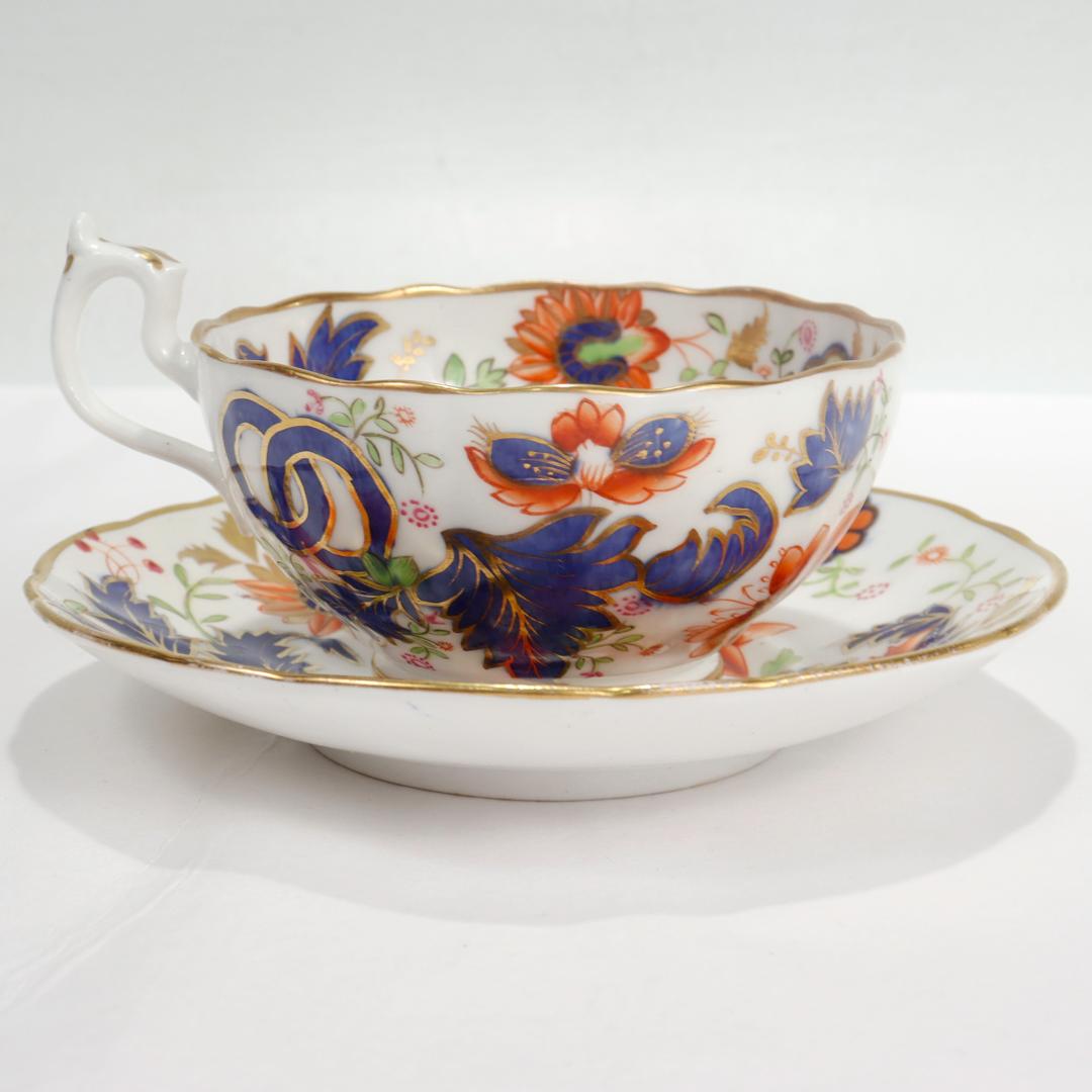 Porcelaine Ancienne tasse à thé et soucoupe en porcelaine anglaise à motif de feuilles de tabac en vente