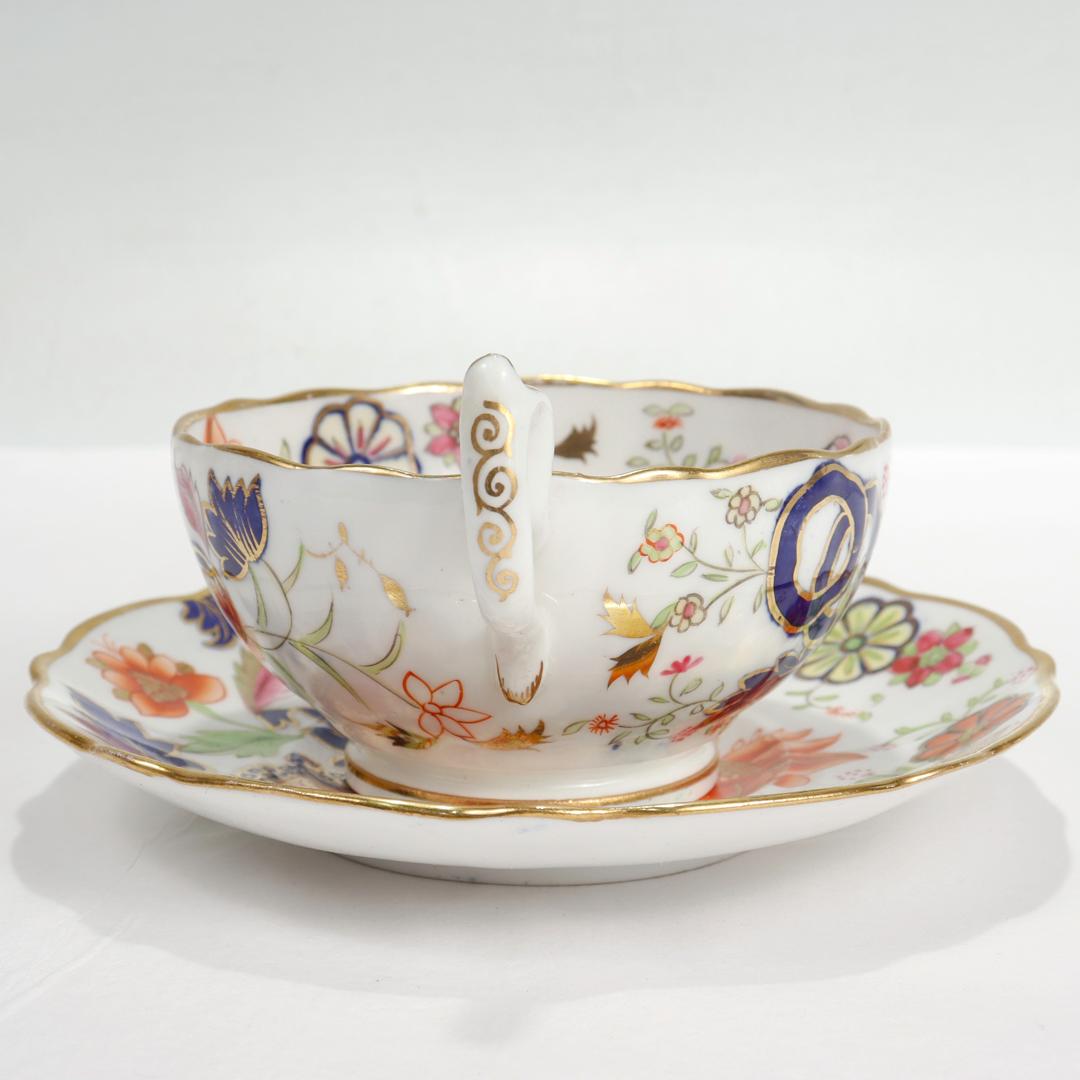 Hand-Painted Antique English Porcelain Pseudo-Tobacco Leaf Pattern Tea Cup & Saucer For Sale