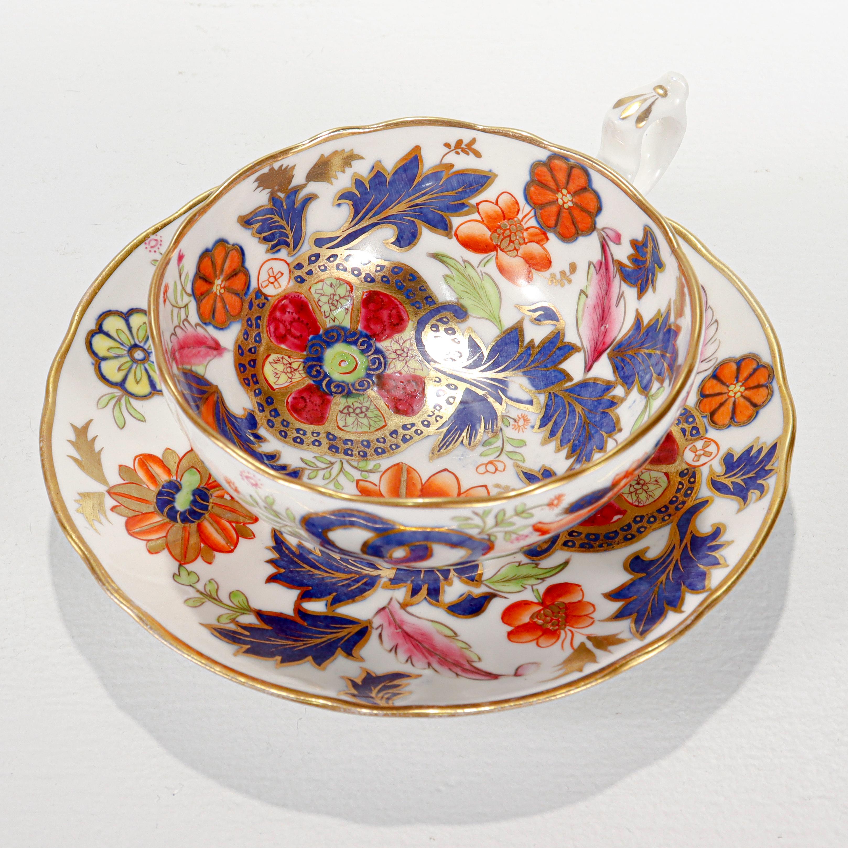 Porcelaine Ancienne tasse à thé et soucoupe en porcelaine anglaise à motif de feuilles de tabac en vente