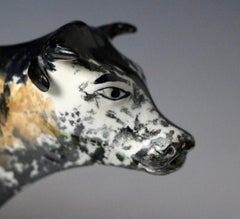Antique English Pottery Cow Creamer Standing on Green Base, Early 19th Century