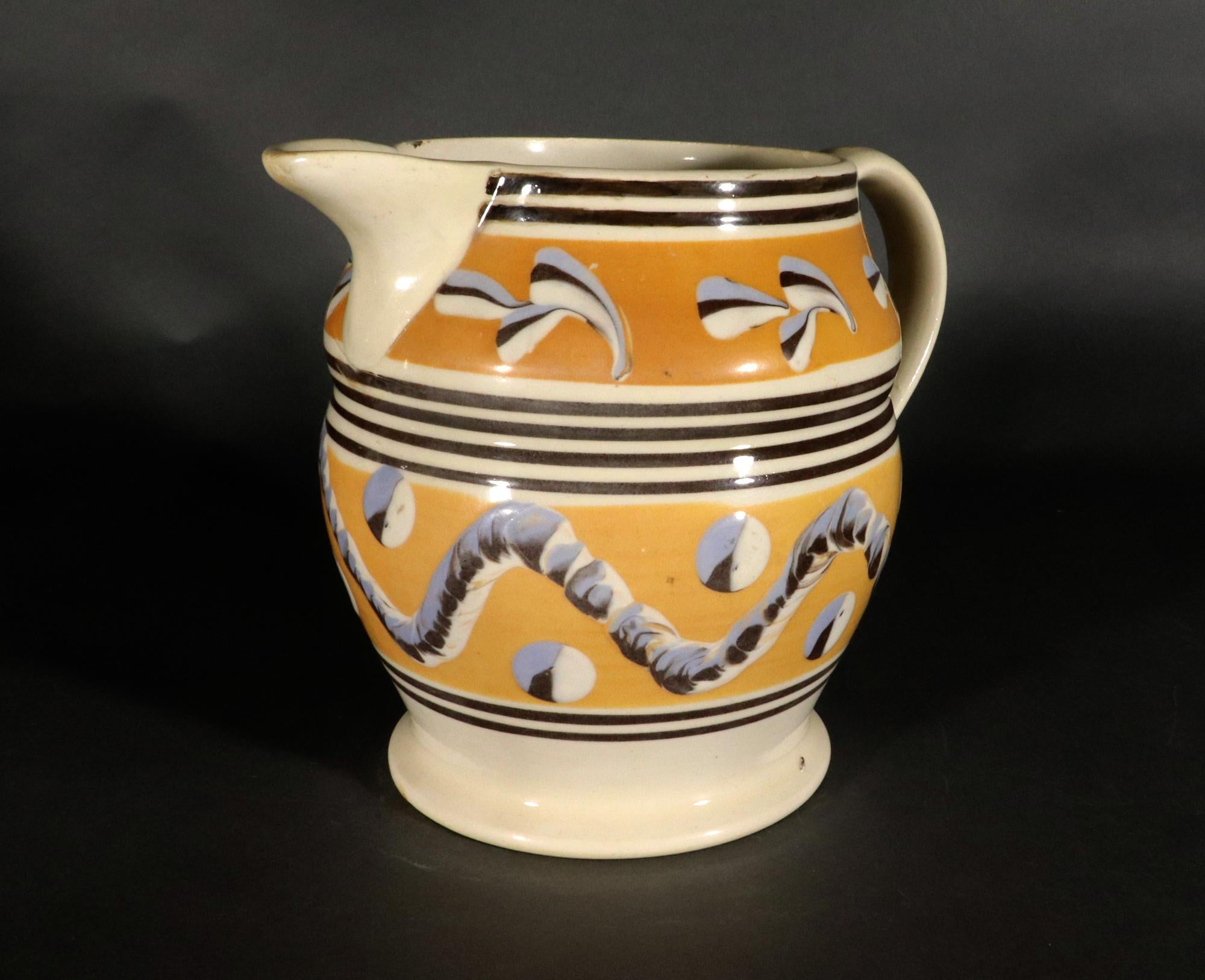 Antique English Yellow Mocha Jug with Leaf, Earthworm and Cat's Eye Designs In Good Condition In Downingtown, PA