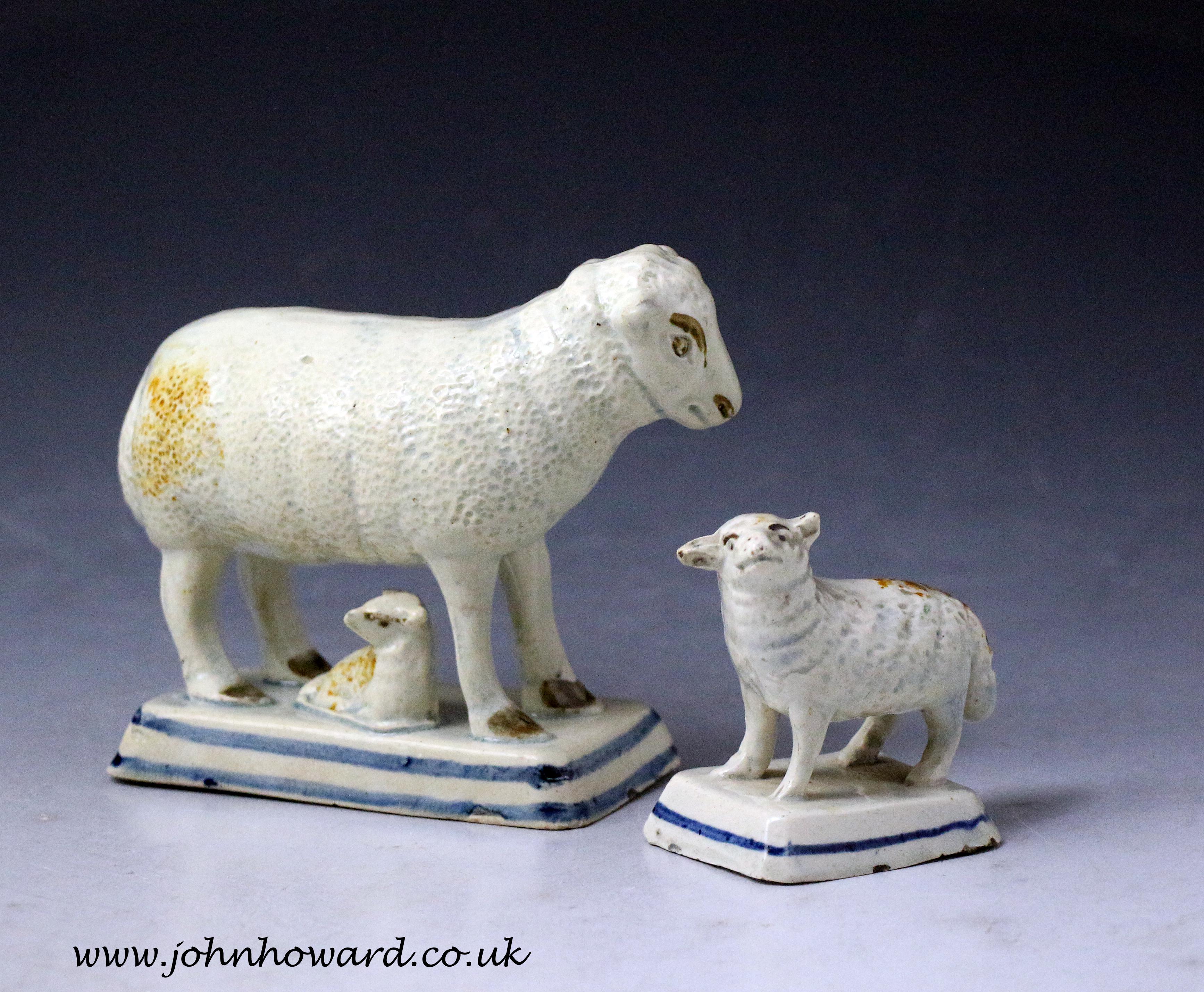 Dated: 1800 Probably, Yorkshire, England

A rare naive pottery duo of a ewe modeled with a lamb together with another figure of a standing lamb. These figures are sponged underglaze ochre-colored with a pearlware glaze, the bases of both pieces