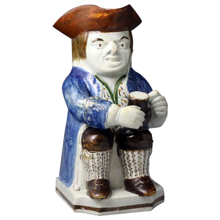 Antique English Pottery Village Idiot Toby Jug in Pratt Colors, 19th Century For Sale