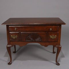Antique English Queen Anne Style Baker School Two-Drawer Caved Mahogany Lowboy