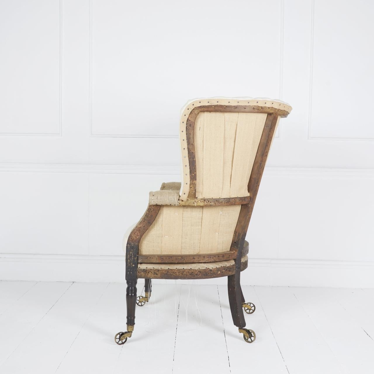Hand-Crafted Antique English Regency Barrel Back Wing Chair For Sale