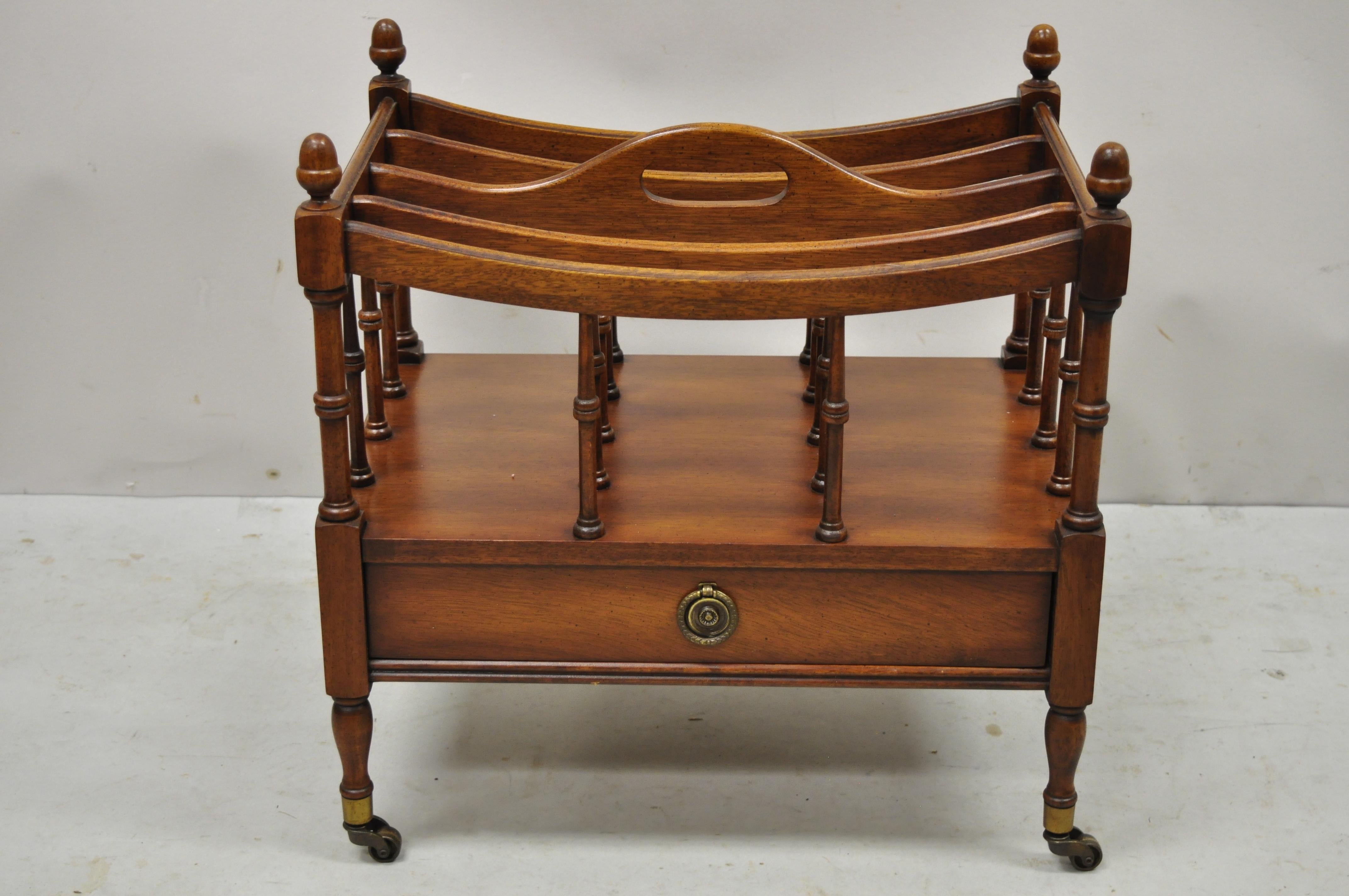 Antique English Regency mahogany canterbury magazine rack w/ drawer by Columbia. Item features brass rolling casters, beautiful wood grain, original label, 1 drawer, very nice antique item, quality American craftsmanship, great style and form. Circa