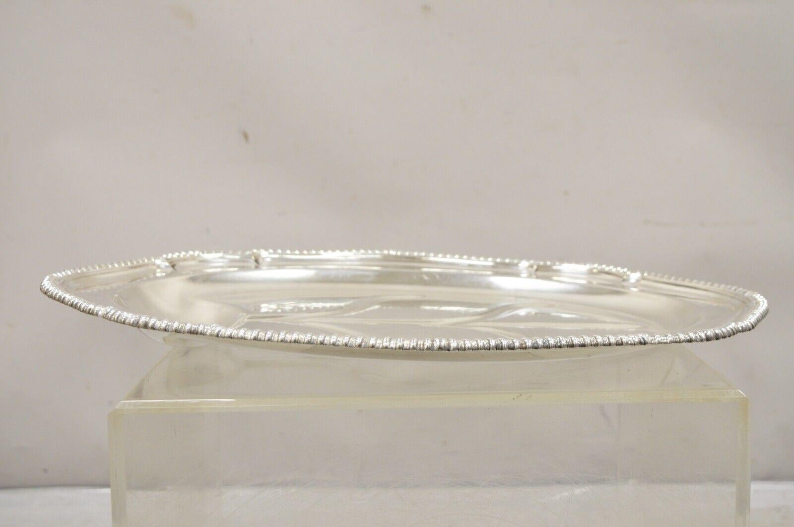 Antique English Regency Oval Silver Plated Meat Cutlery Serving Platter Tray. Item features two engraved deer head to rim, original hallmark very nice antique tray. Does not sit evenly (see pics). Circa Early to Mid 20th Century. Measurements: 2