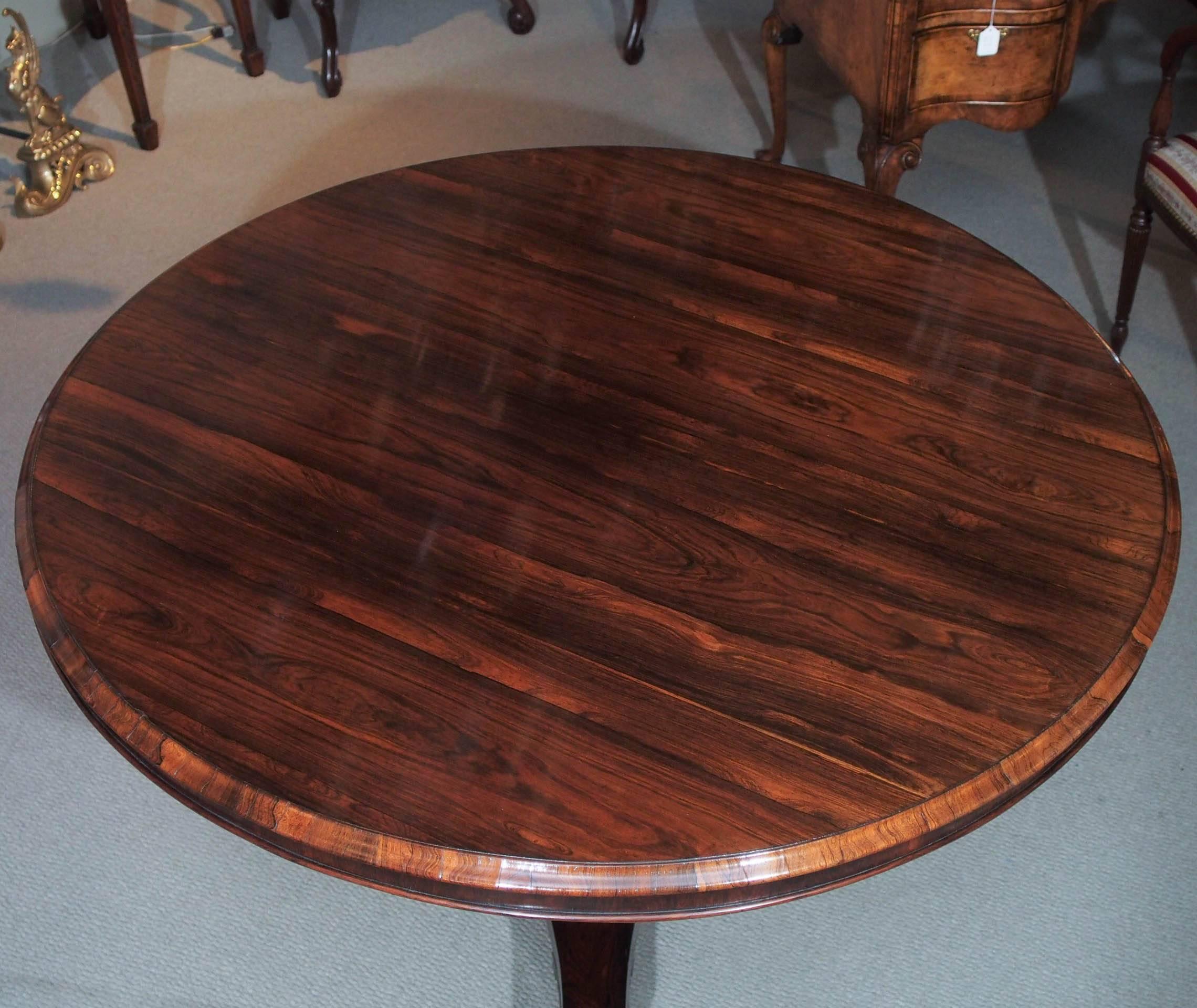 19th century English Regency rosewood centre table on pedestal base.