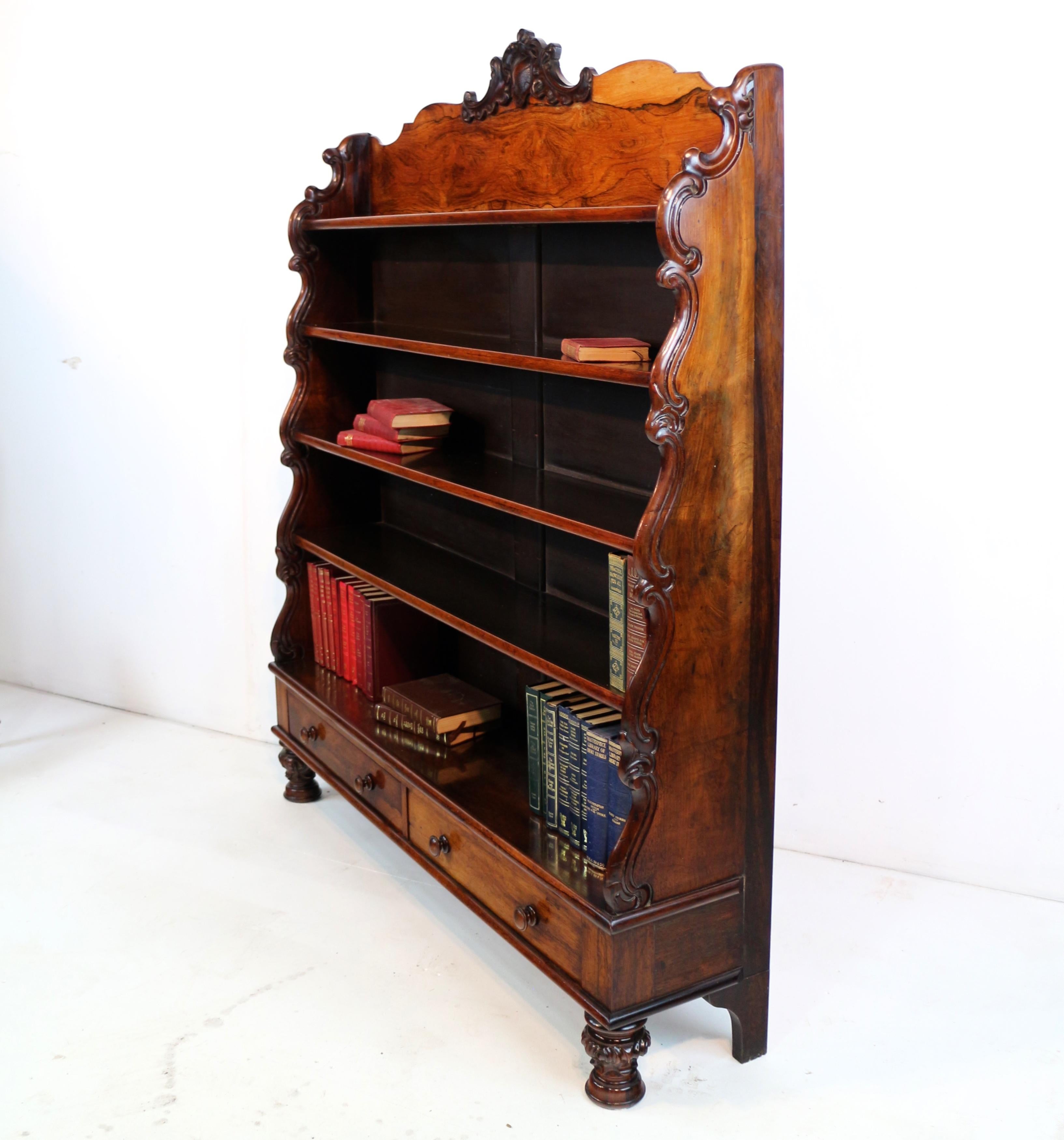 Hand-Carved Antique English Regency Rosewood Waterfall Bookcase with Drawers For Sale