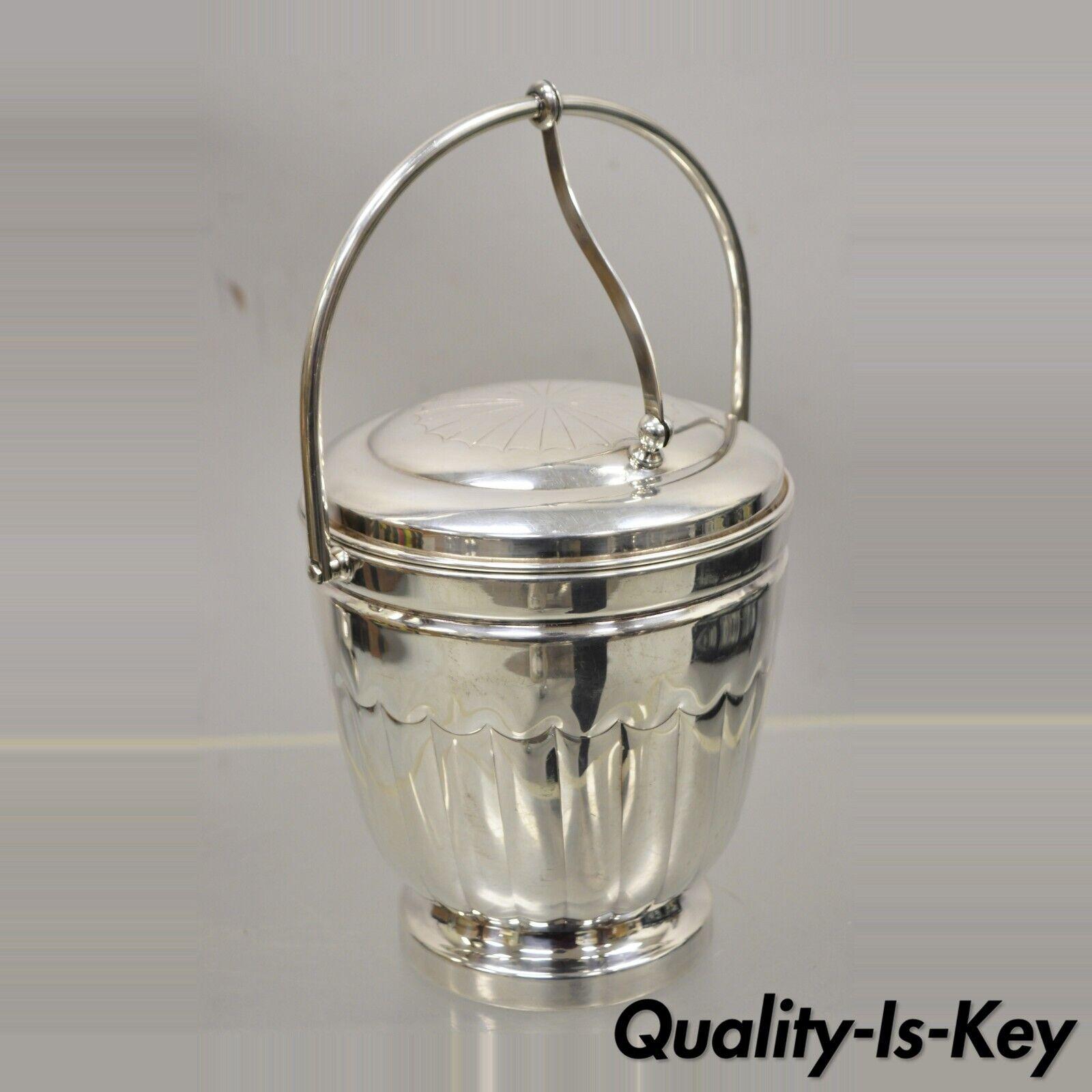 Antique English Regency Silver Plate Ice Bucket with Reticulating Hinge Lid Handle. Item features a mercury glass lined interior, etched tongs to inner lid, lifting lid with reticulated swing handle, crown mark to underside, very nice antique item,