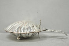 Plato de servicio de mesa antiguo inglés de la época Regencia, con forma de concha de almeja y chapado en plata