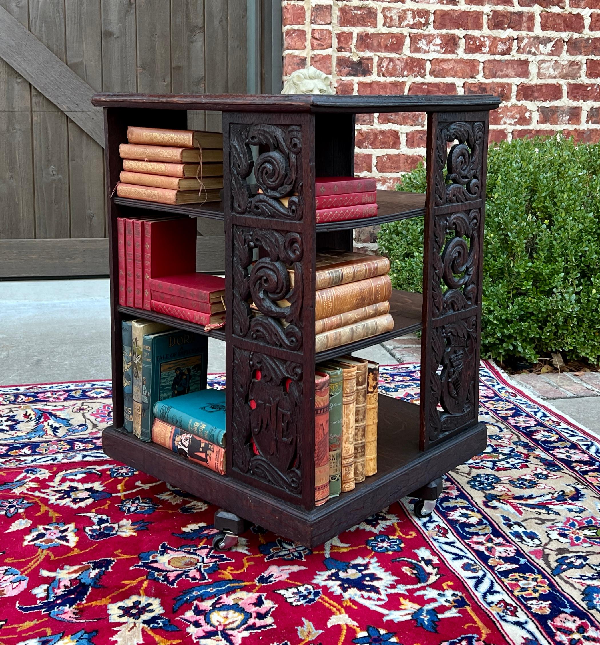 BEAUTIFUL Antique English Dark Oak Revolving Bookcase  

PERFECT for displaying your favorite antique books or collectibles~~top surface is beautifully carved

~~28.25