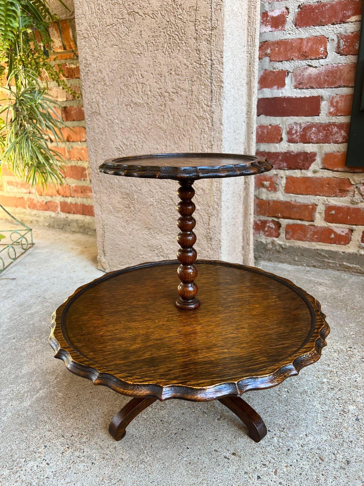 Antique English Revolving Dessert Server Cookie Muffin Display Tea Stand.

 Direct from England, a fabulous antique “muffin” or dessert server!
Classic British style, with two shelves, both having scalloped “pie crust” edges.  Traditional “bobbin”