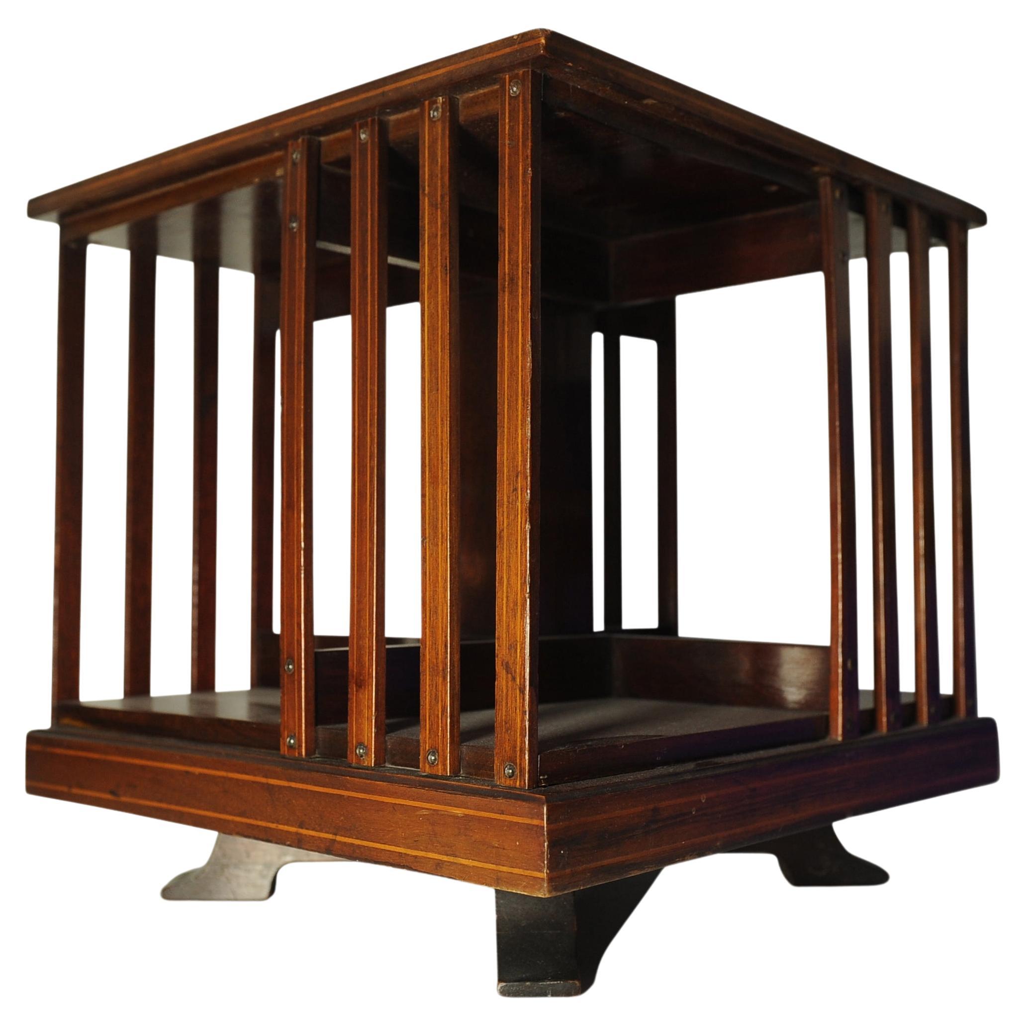 An Early 20th Century Handmade Mahogany Revolving Tabletop Bookcase With In-Lay Detailing & Flame Mahogany Top 

Well executed handmade made bookcase on rotating base. 

Extra dimensions 
Inside shelf height 23cm
Inside shelf width 19cm 
Inside