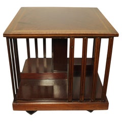 Ancienne bibliothèque anglaise tournante avec plateau de table en acajou flammé incrusté