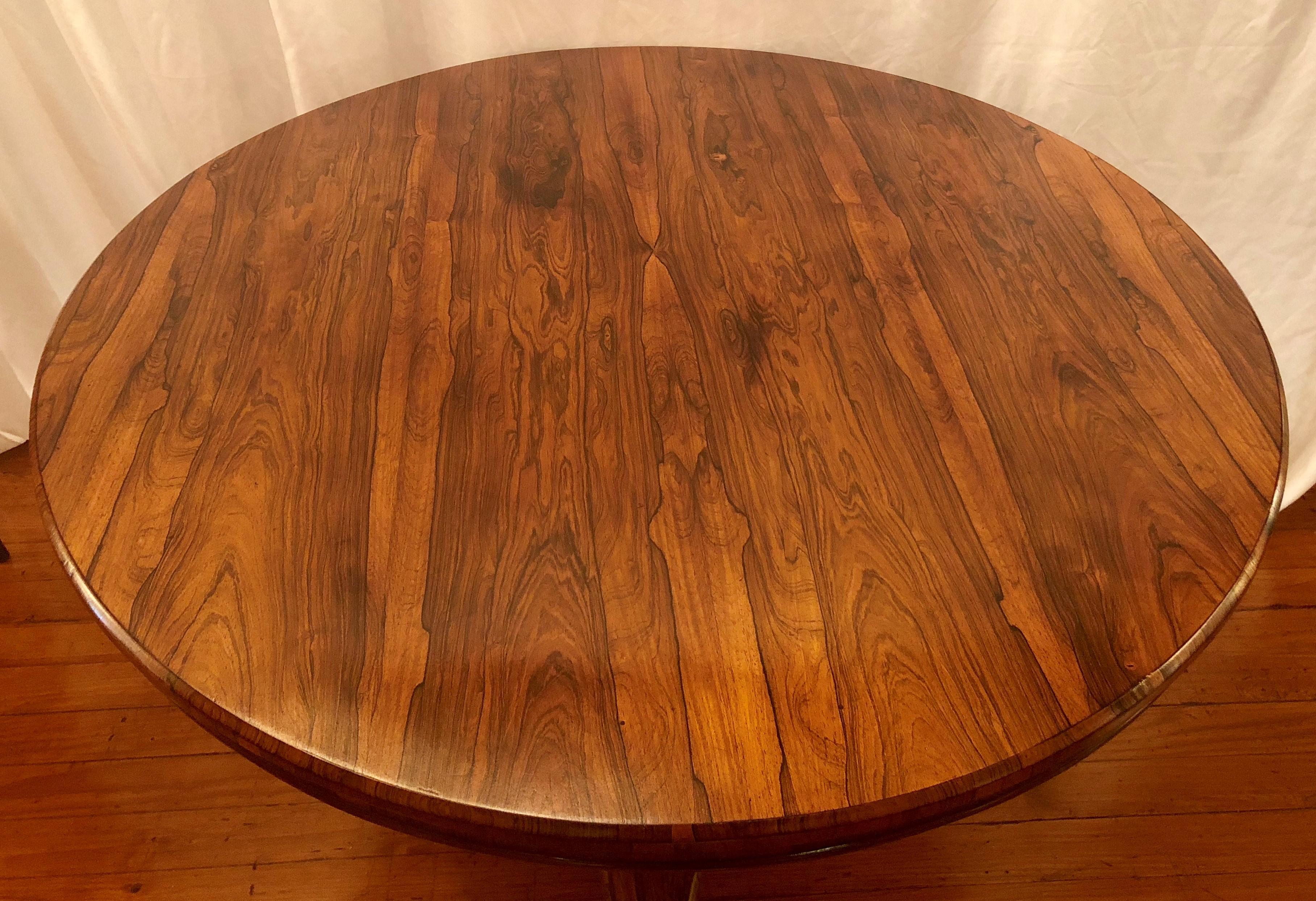 Antique English rosewood center table.