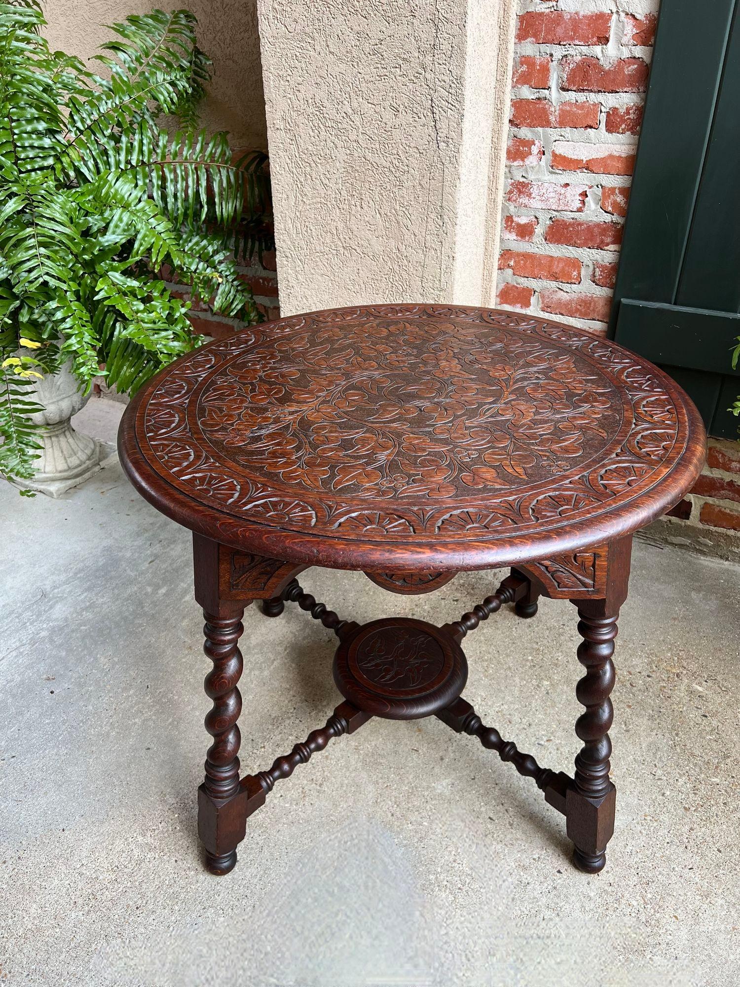 Antique English ROUND Side Center Table BARLEY TWIST Carved Oak Jacobean c1910.

Direct from England, another fabulous antique British side or center table, with superb design and a stunning silhouette. A statement piece for any room, the table
