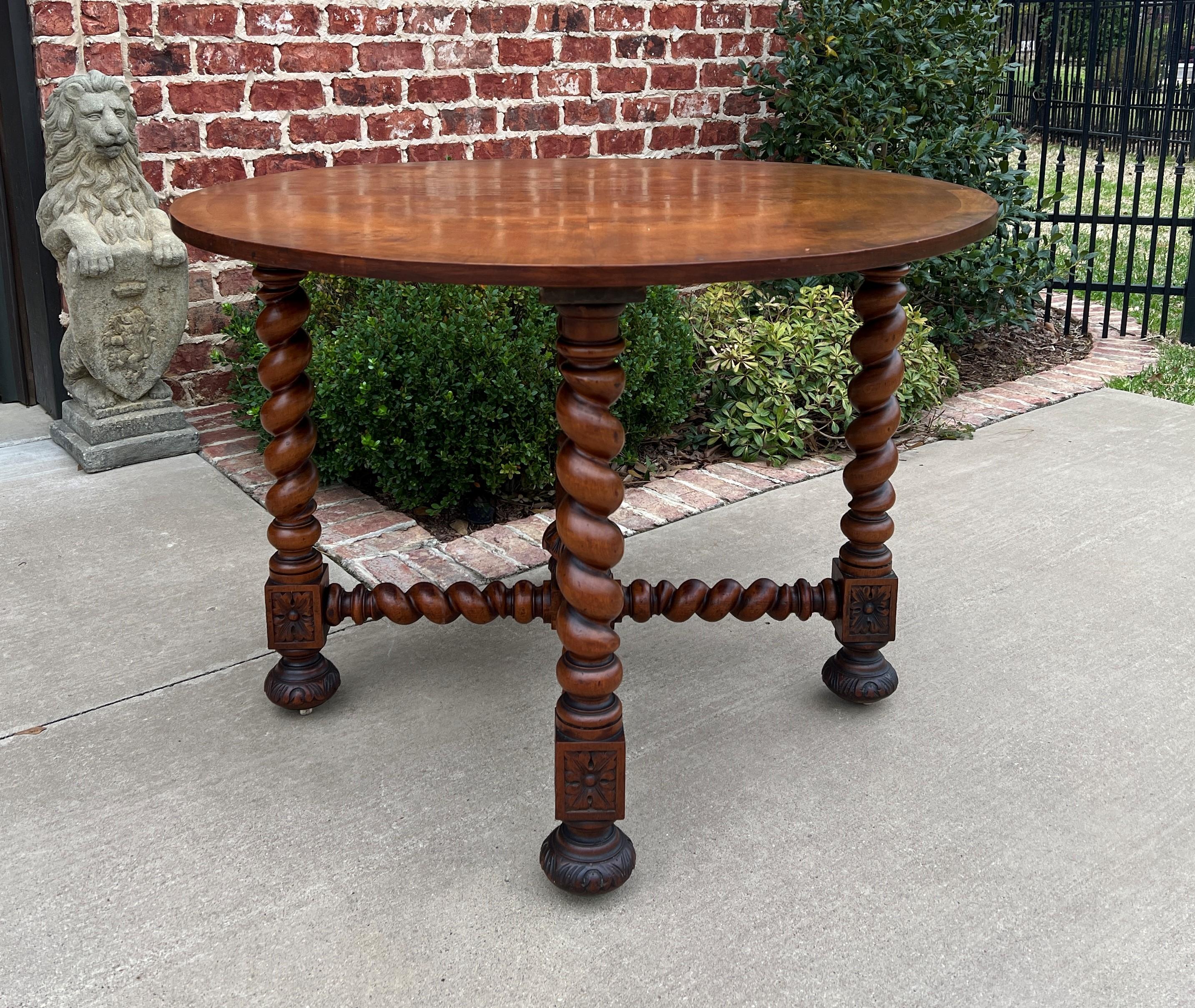 Wonderful late 19th century Antique English Barley twist burl walnut round table~~Victorian Era Renaissance Revival
~~circa 1890s

Very versatile table with barley twist legs, stretcher, and 