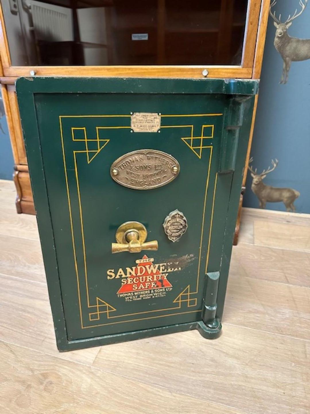 Beautiful small antique English safe in good and completely original condition. With original key and well-functioning lock. No key for inner drawer.
Safe is from the company: Thomas Withers & Son and sold by the company “The Miscellaneous Disposals