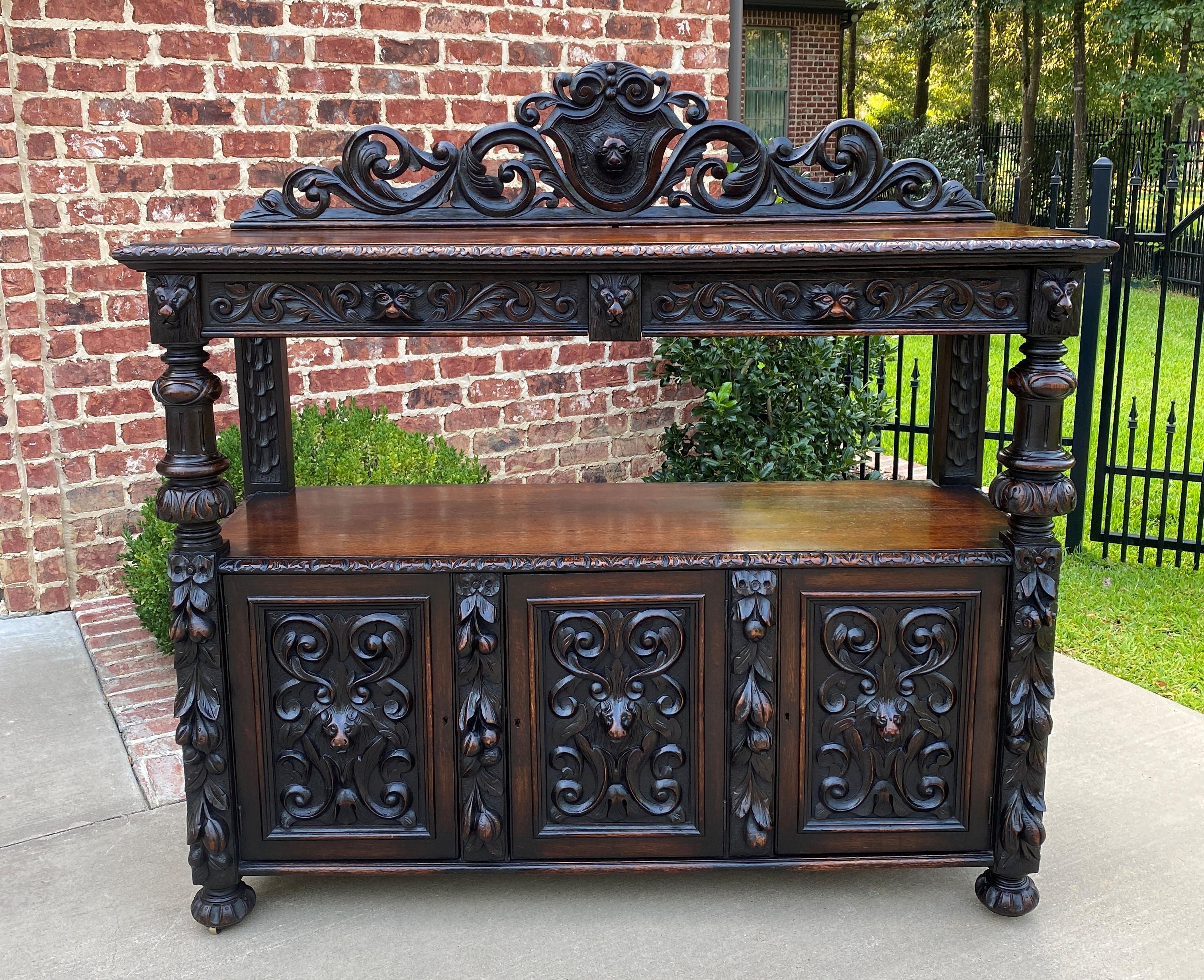 Gorgeous antique English oak 2-tier Renaissance Revival server, sideboard or buffet with center drawers and lower cabinets~~c. 1890s

Wonderful highly carved oak 2-tier sideboard or server~~fill it with your favorite Majolica, Imari,