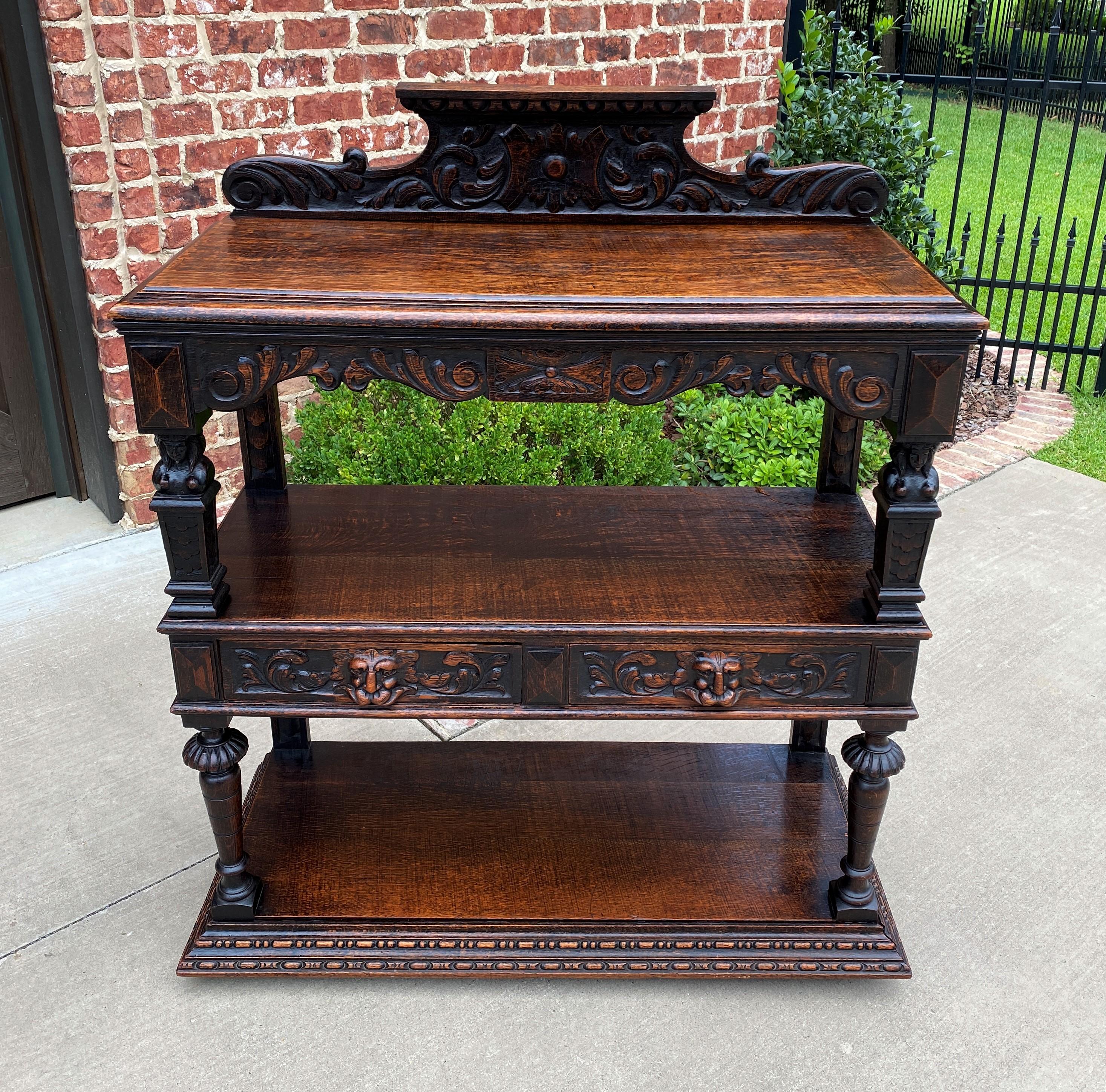 Charming and versatile antique English oak 3-tier Gothic revival server, sideboard or buffet with center drawers~~c. 1890s

Wonderful carved oak 3-tier sideboard or server ~~fill it with your favorite Majolica, Imari, Staffordshire, pottery,