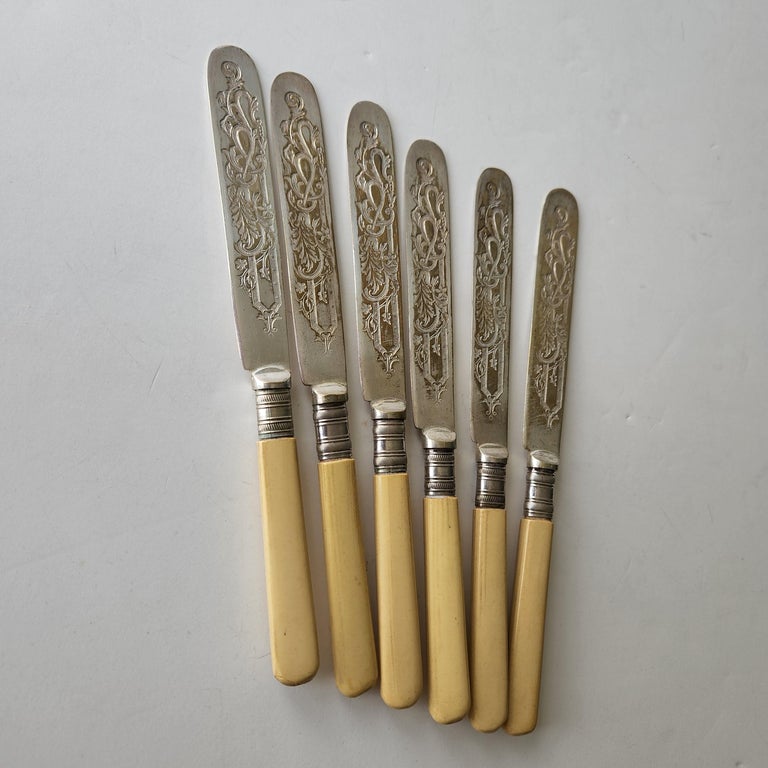 6 anciens porte couteau en X en metal argenté epoque 1900