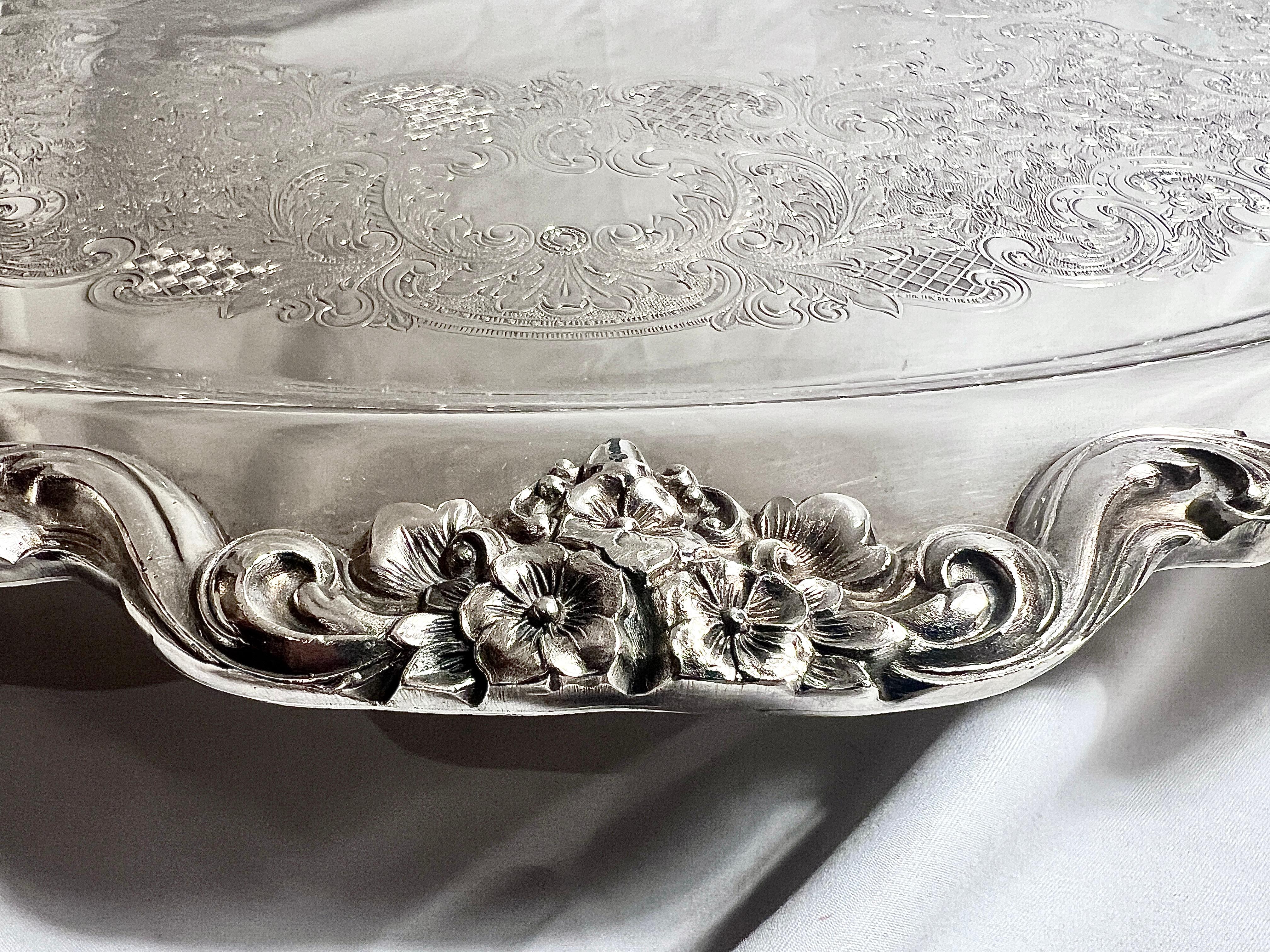 Antique English Sheffield Silver Footed Tray with Rose Border, Circa 1890.
We have a similar tray to this one which is not footed.  See Reference LU2854336787592 or SIL842
