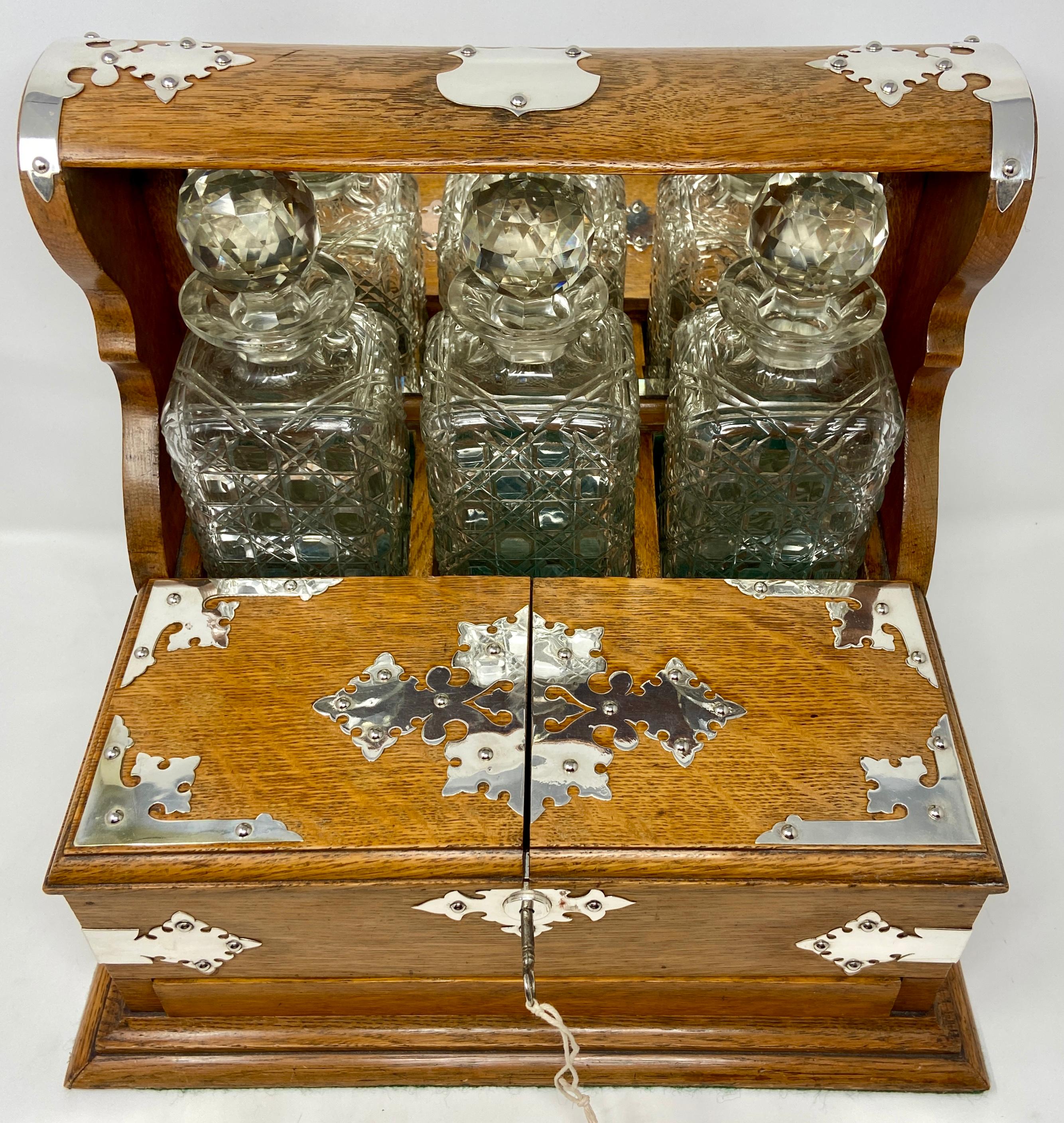 Antique english sheffield silver-plate mounted golden oak games box tantalus, Circa 1880.