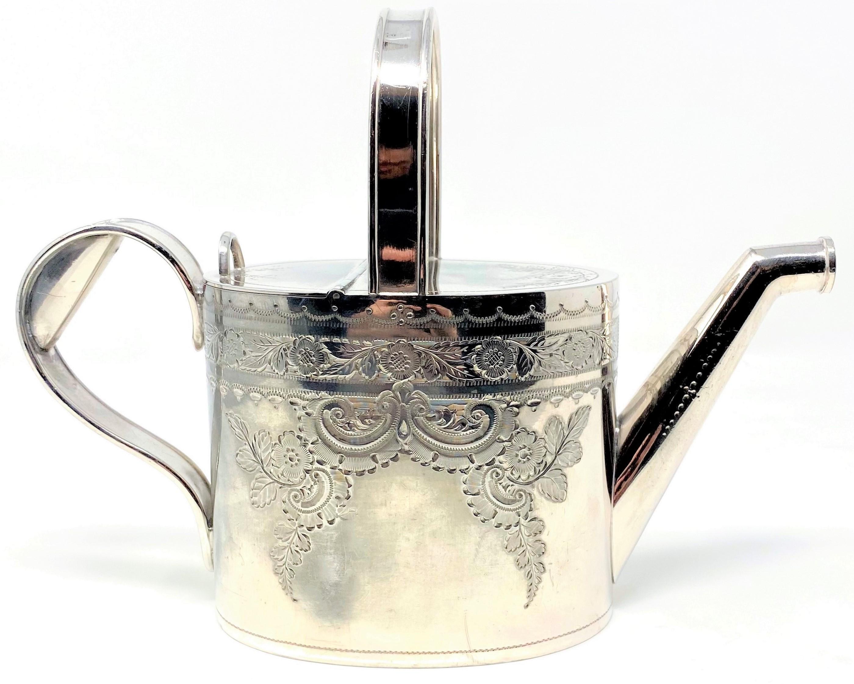 Small antique English Edwardian Sheffield silver plated and hand engraved watering can, circa 1910.