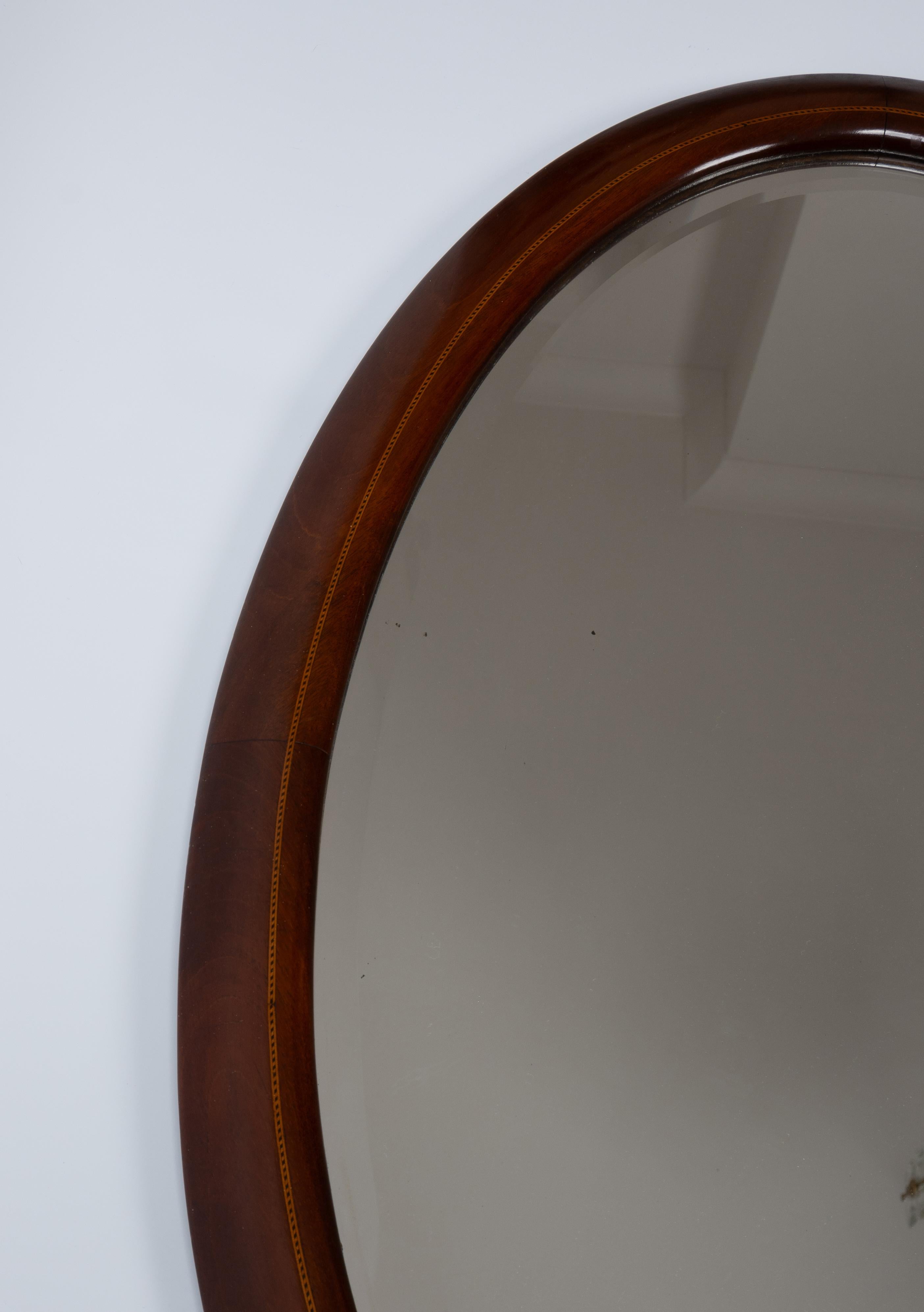 Early 20th Century Antique English Sheraton Revival Cushioned Inlaid Mahogany Oval Mirror  For Sale