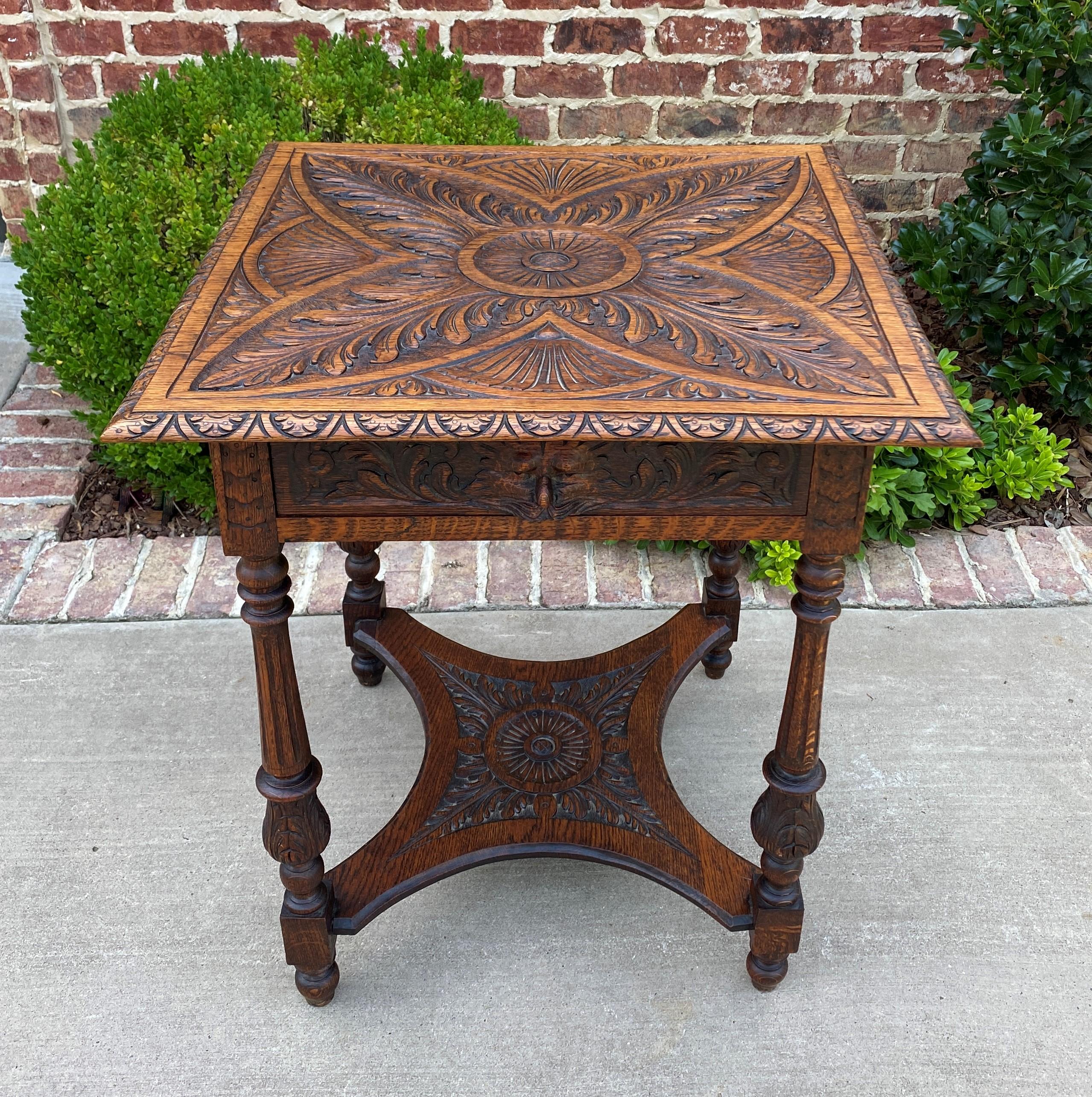 Highly carved Antique English Oak 2-Tier End Table Side Occasional Table or Nightstand with Drawer~~c. 1900 

Beautifully carved top and lower shelf ~~carved on all 4 sides~~one center drawer~~turned post legs

Versatile size~~30