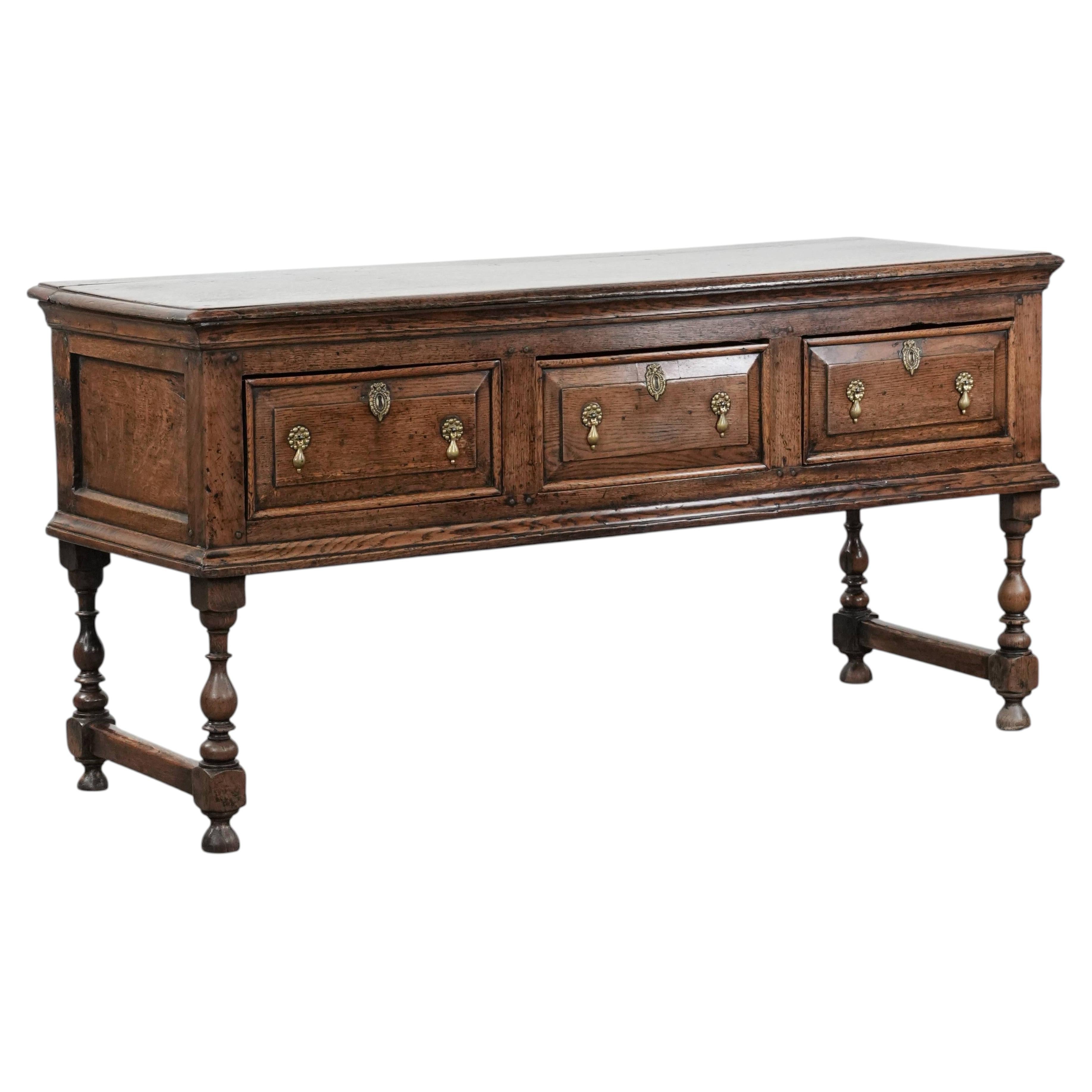 Antique English sideboard from the early 18th century made of oak