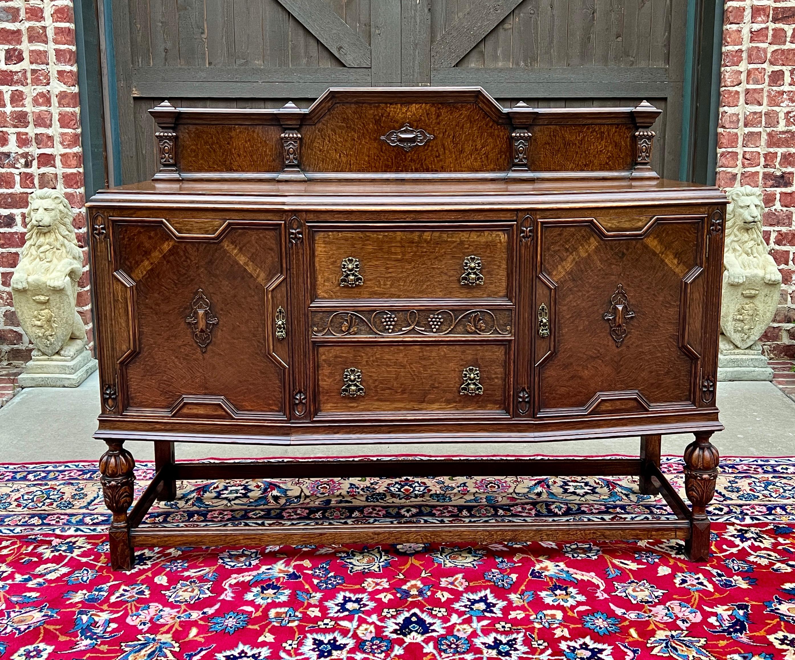     CHARMING Antique English Tiger Oak Bow Front Sideboard, Cabinet, Server or Buffet c.1930s

    Cup and cover legs with cherub-faced hardware~~3 center drawers including one concealed felt lined silverware drawer~~lower double doors with ball
