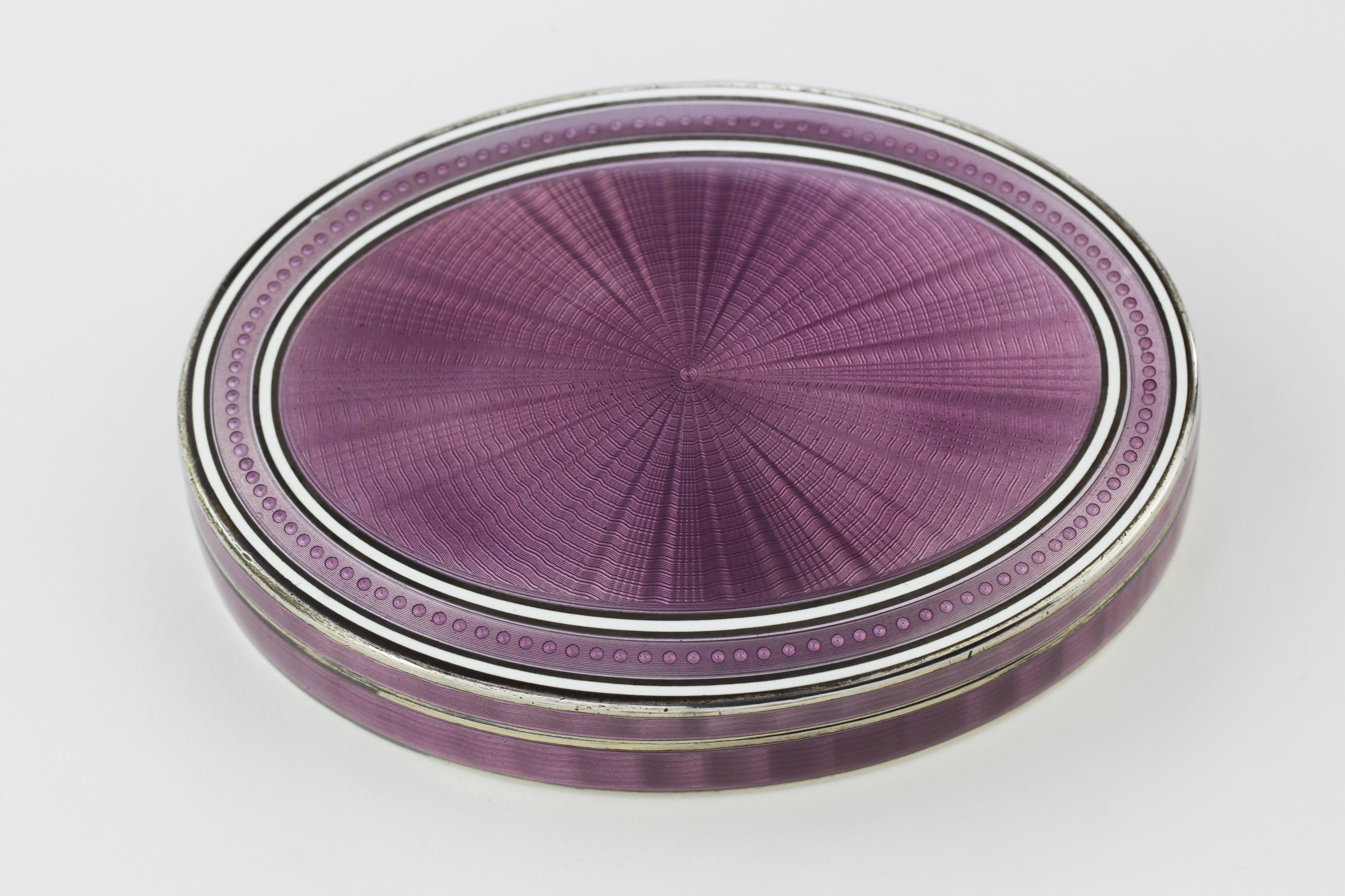 Antique English silver imported purple guilloche enamel box
Maker: Adolph Philip Krieger
London import hallmark Dating 1911
Fully hallmarked.

Dimensions:
Length 10.5 cm
Width 7.3 cm
Height 2.2 cm
Weight 240 grams

Condition: Minor