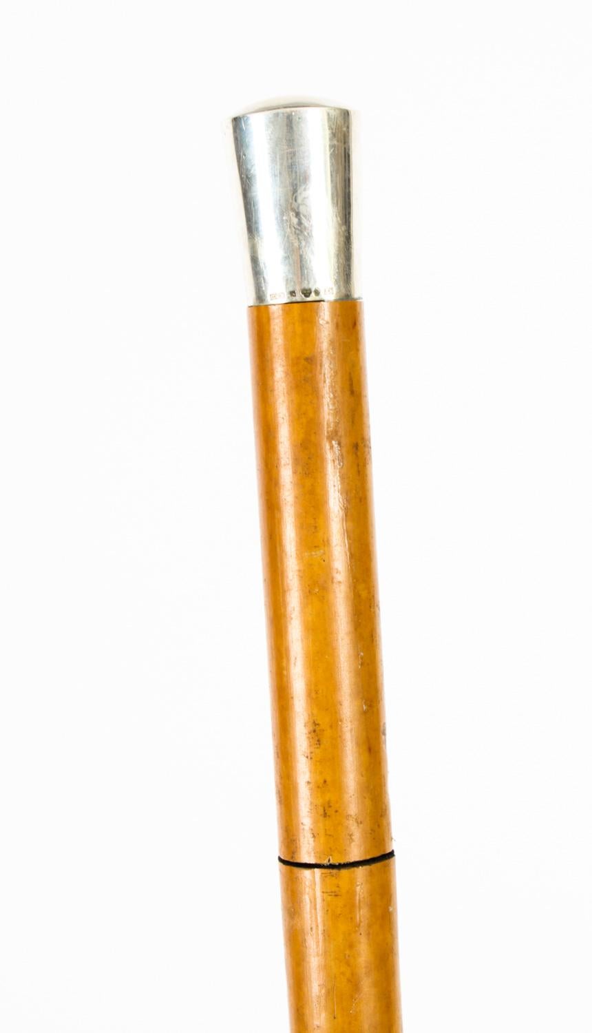 A 19th century silver topped Malacca sword stick with turned tapering silver pommel on malacca cane enclosing a triform steel blade 87cm overall

This is a beautiful antique English gentleman's malacca and sterling silver pommel walking / sword