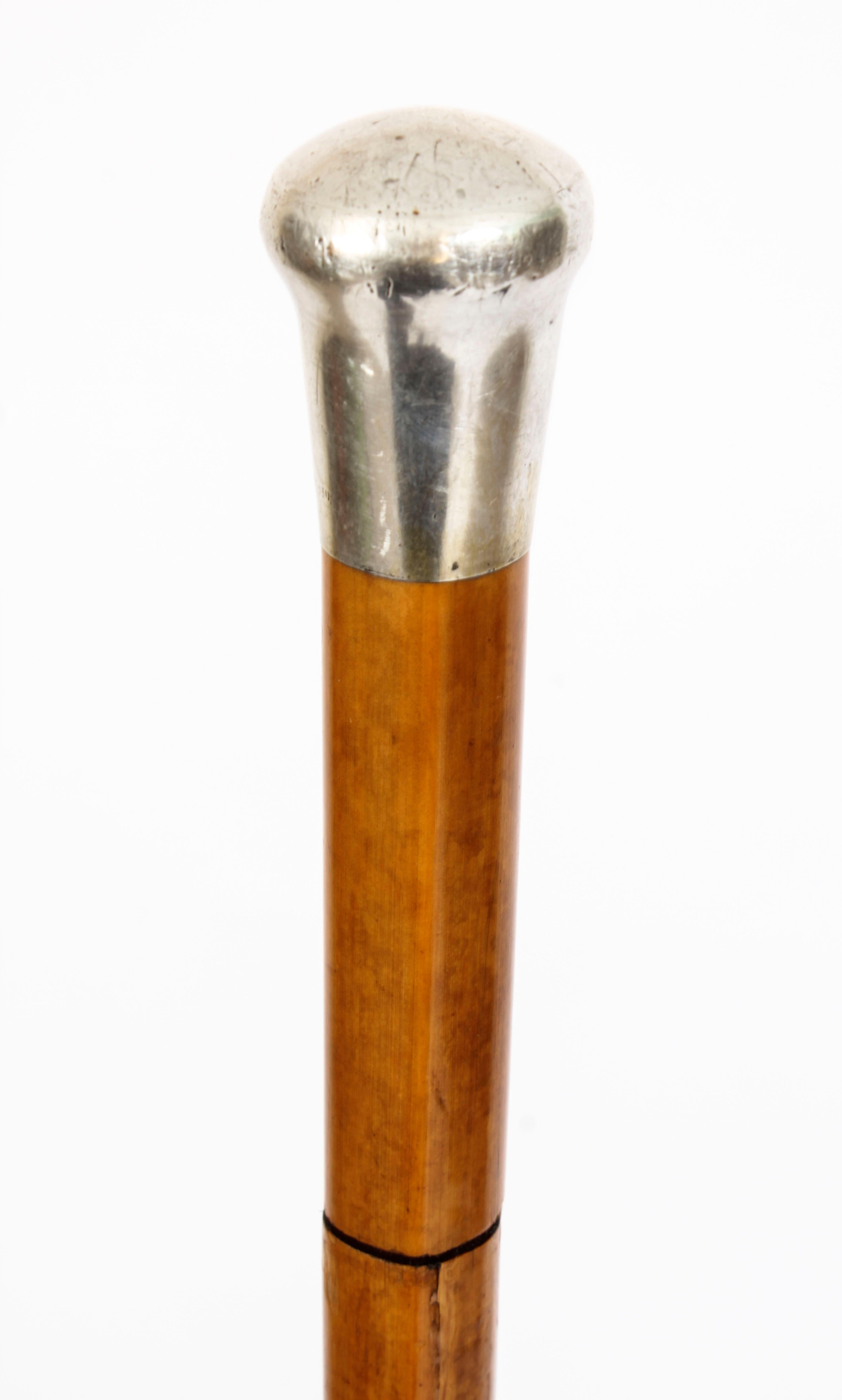 This is a beautiful antique English gentleman's malacca and sterling silver pommel walking / sword stick, circa 1890 in date.
 
The striking stick features a cylindrical shaped silver pommel on a gentle tapering malacca shaft. It has its original